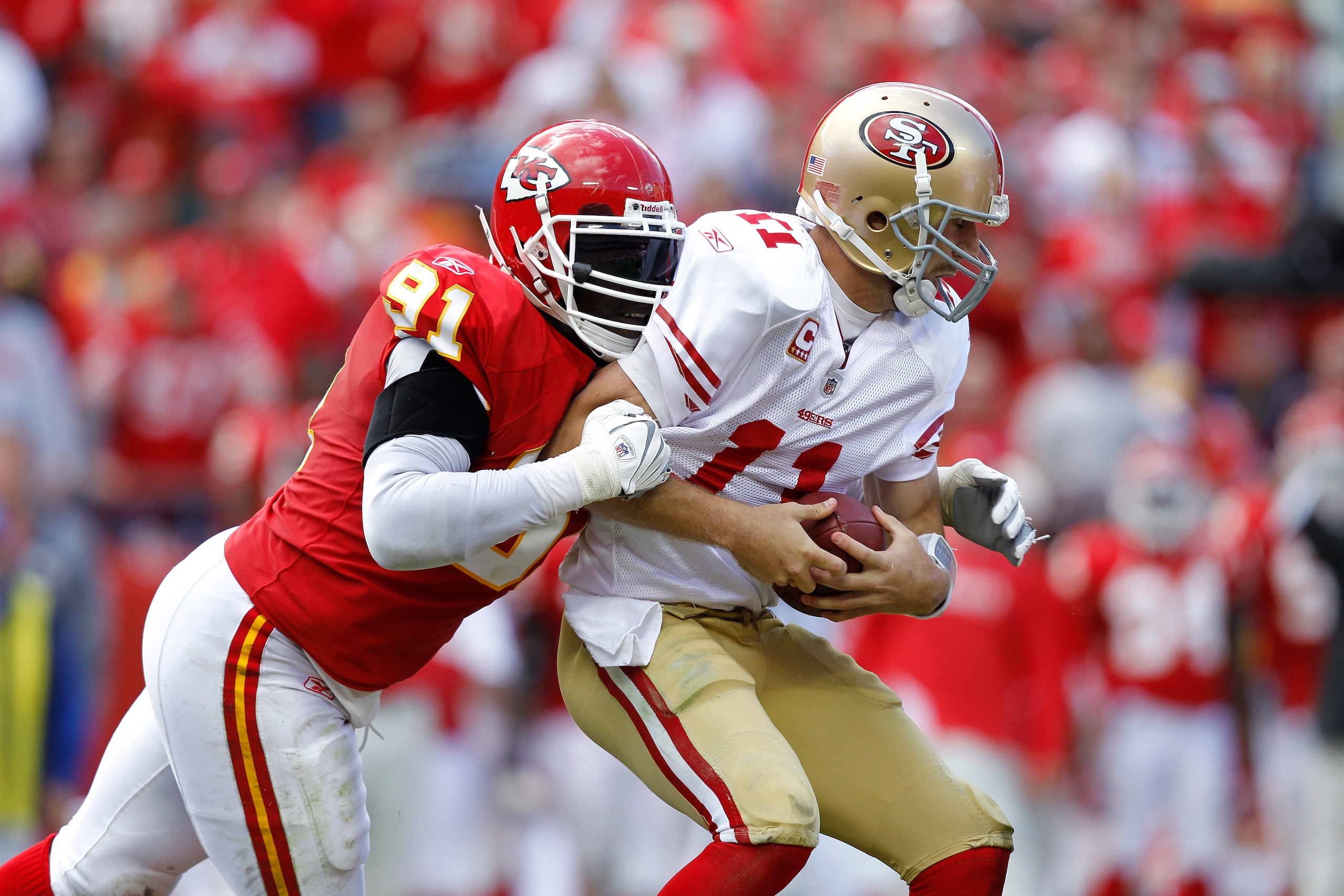 KANSAS CITY, MO - SEPTEMBER 26: Tamba Hali #91 of the Kansas City Chiefs sacks Alex Smith #11 of the San Francisco 49ers at Arrowhead Stadium on September 26, 2010 in Kansas City, Missouri. The Chiefs won 31-10. (Photo by Joe Robbins/Getty Images) KANSAS CITY, MO - SEPTEMBER 26: Tamba Hali #91 of the Kansas City Chiefs sacks Alex Smith #11 of the San Francisco 49ers at Arrowhead Stadium on September 26, 2010 in Kansas City, Missouri. The Chiefs won 31-10. (Photo by Joe Robbins/Getty Images)