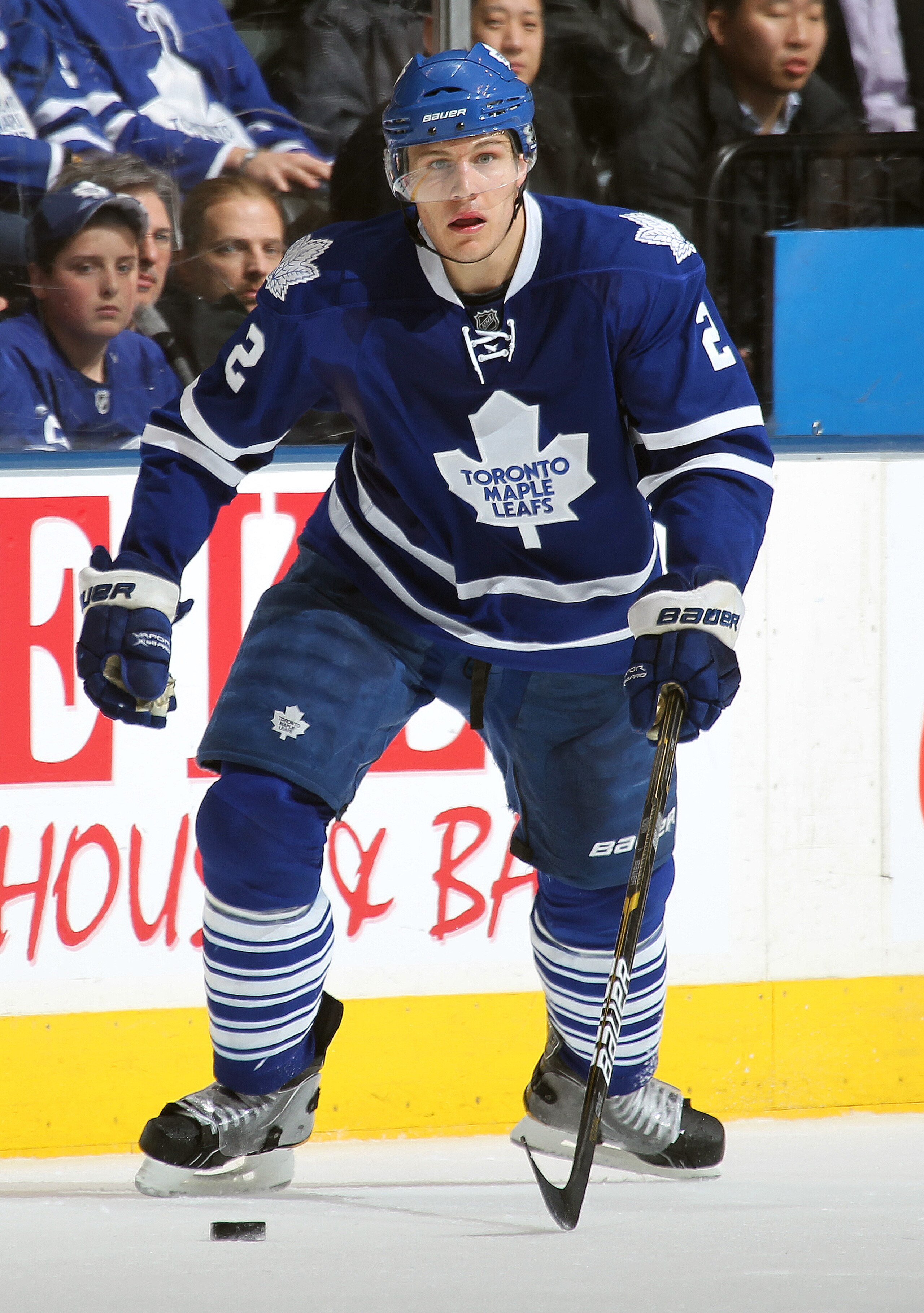 TORONTO, CAN - FEBRUARY 7:  Luke Schenn #2 of the Toronto Maple Leafs skates with the puck in a game against the Atlanta Thrashers on February 7, 2011 at the Air Canada Centre in Toronto, Canada. The Leafs defeated the Thrashers 5-4. (Photo by Claus Ander