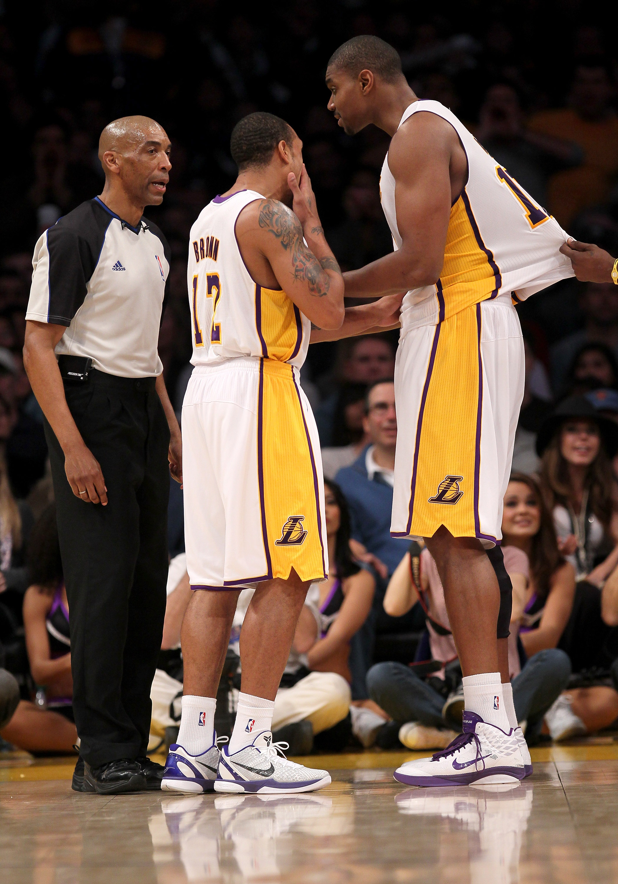 LOS ANGELES, CA - JANUARY 09:  Andrew Bynum #17 of the Los Angeles Lakers complains to  referee Tony Brown as Shannon Brown #12 in tries to intervene in the game against the New York Knicks at Staples Center on January 9, 2011 in Los Angeles, California.