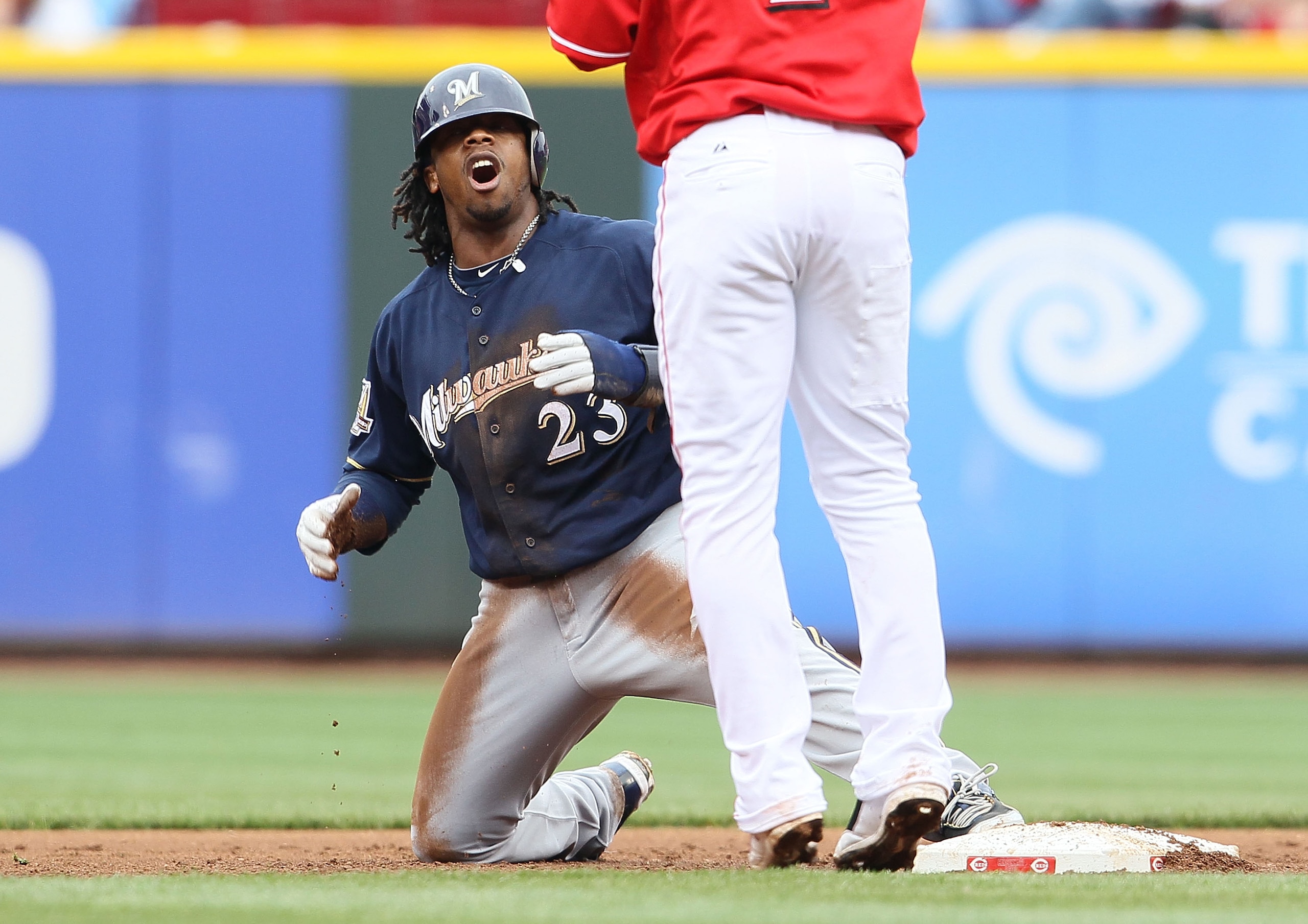 CINCINNATI - MAY 18:  Rickie Weeks #23 of the Milwaukee Brewers reacts after being tagged out while attempting to steal second base by Orlando Cabrera #2 of the Cincinnati Reds during the game at Great American Ball Park on May 18, 2010 in Cincinnati, Ohi