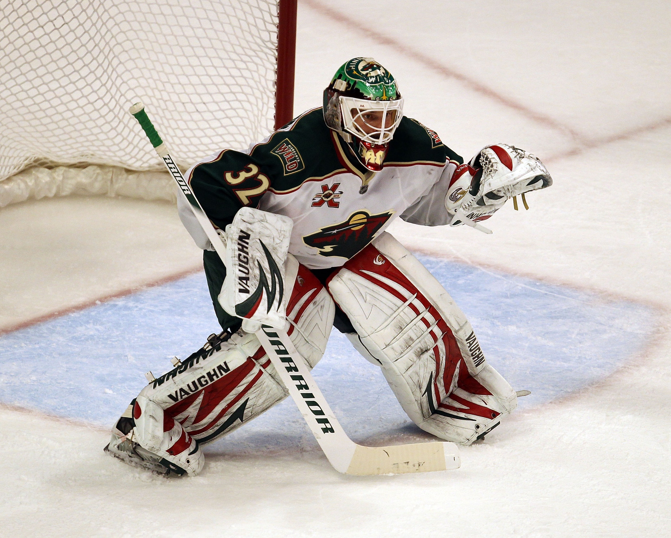 CHICAGO, IL - JANUARY 25: Niklas Backstrom #32 of the Minnesota Wild sets to protect the goal against the Chicago Blackhawks at the United Center on January 25, 2011 in Chicago, Illinois. The Wild defeated the Blackhawks 4-2. (Photo by Jonathan Daniel/Get