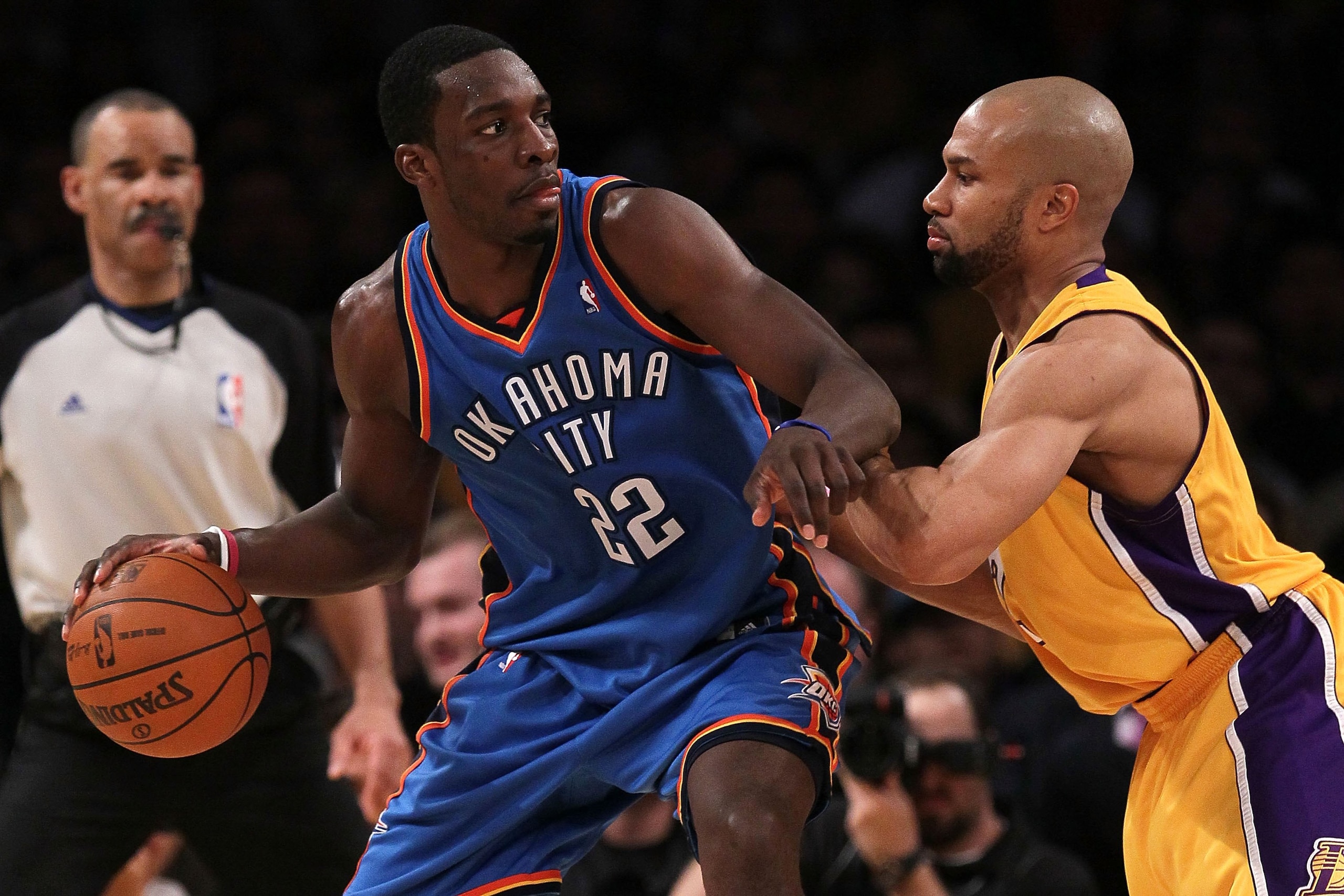 LOS ANGELES, CA - APRIL 27:  Jeff Green #22 of the Oklahoma City Thunder posts up Derek Fisher #2 of the Los Angeles Lakers during Game Five of the Western Conference Quarterfinals of the 2010 NBA Playoffs at Staples Center on April 27, 2010 in Los Angele