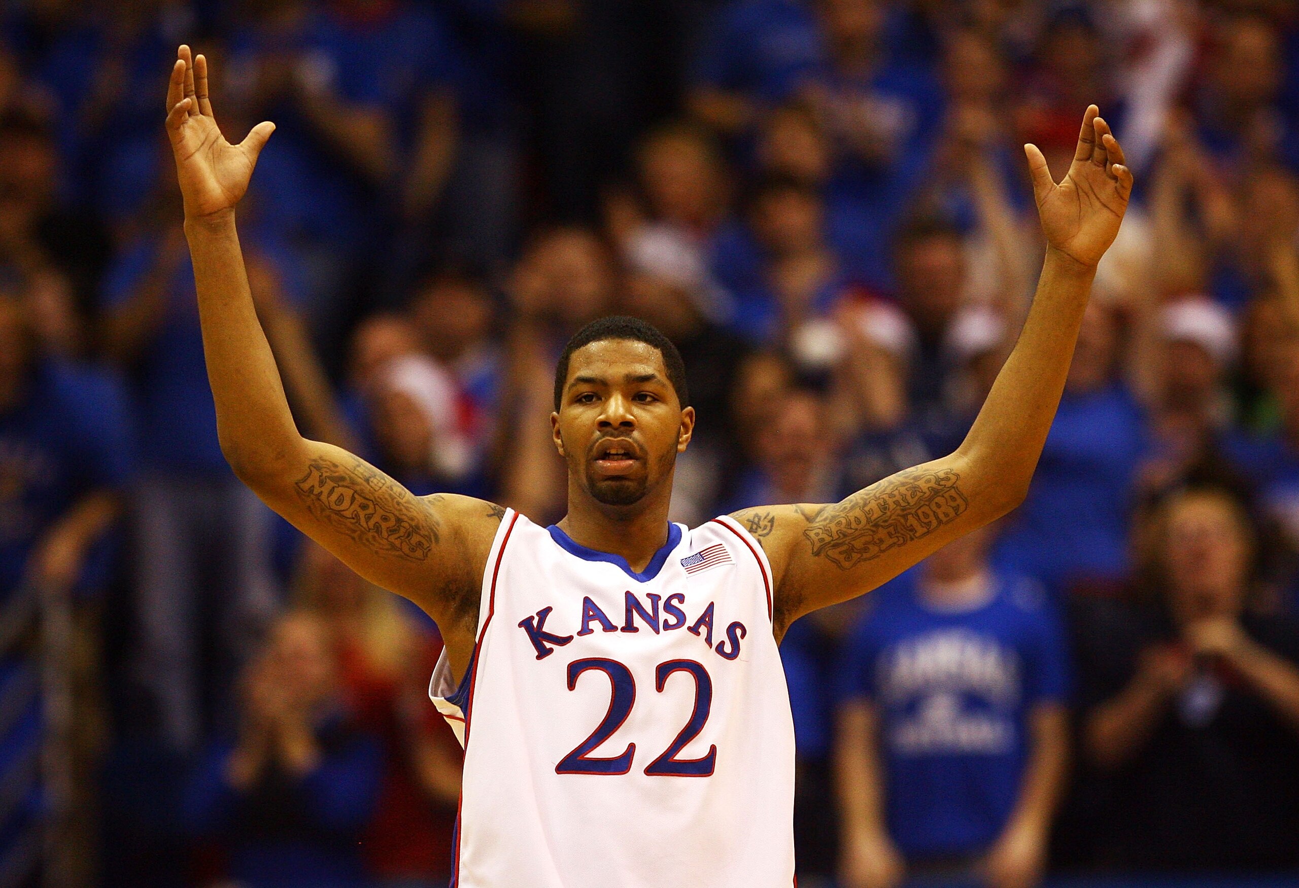 LAWRENCE, KS - DECEMBER 19:  Marcus Morris #22 of the Kansas Jayhawks celebrates after scoring during the game against the Mighigan Wolverines on December 19, 2009 at Allen Fieldhouse in Lawrence, Kansas.  (Photo by Jamie Squire/Getty Images)