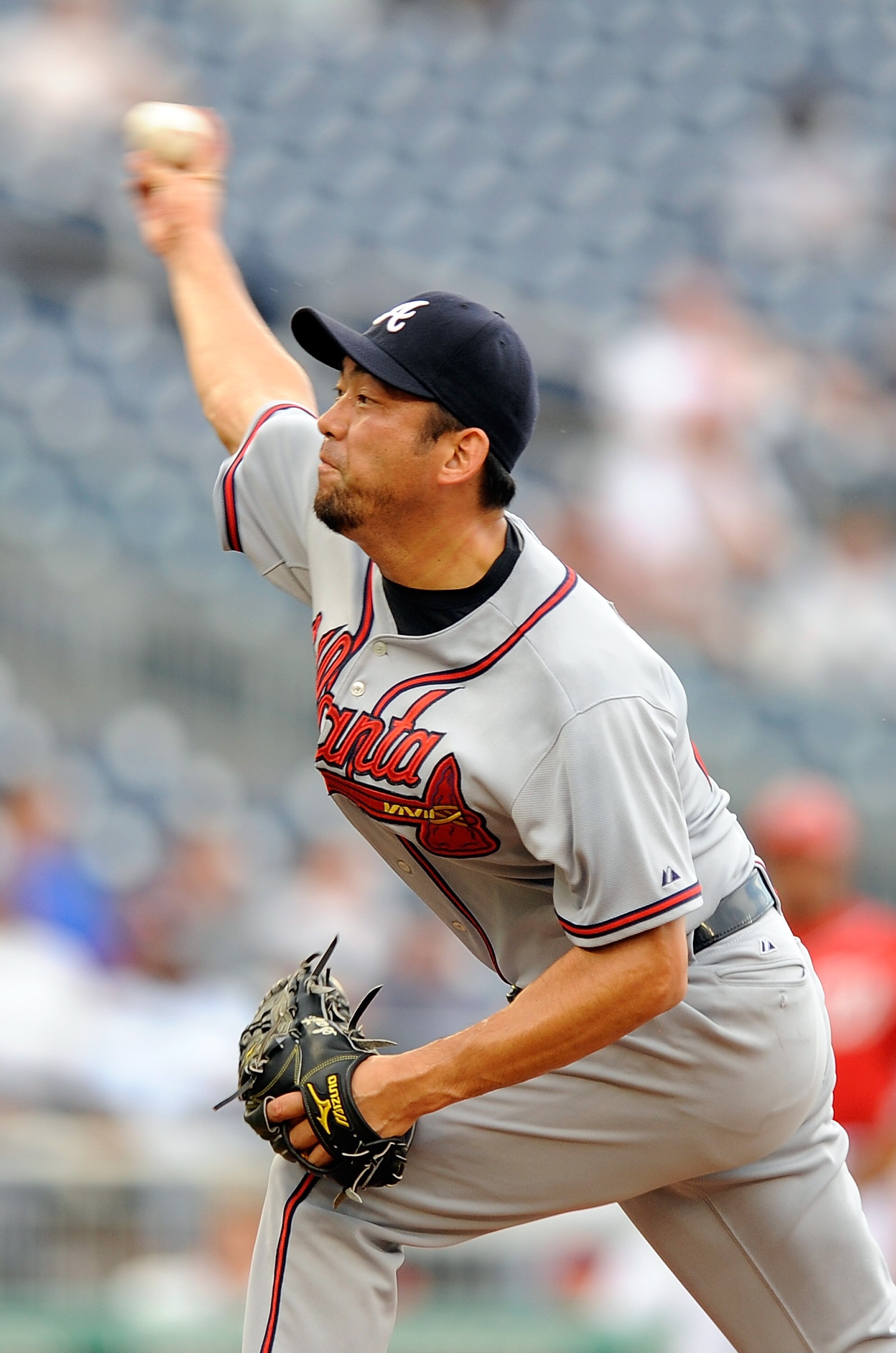WASHINGTON - JULY 29:  Takashi Saito #40 of the Atlanta Braves pitches against the Washington Nationals at Nationals Park on July 29, 2010 in Washington, DC.  (Photo by Greg Fiume/Getty Images)