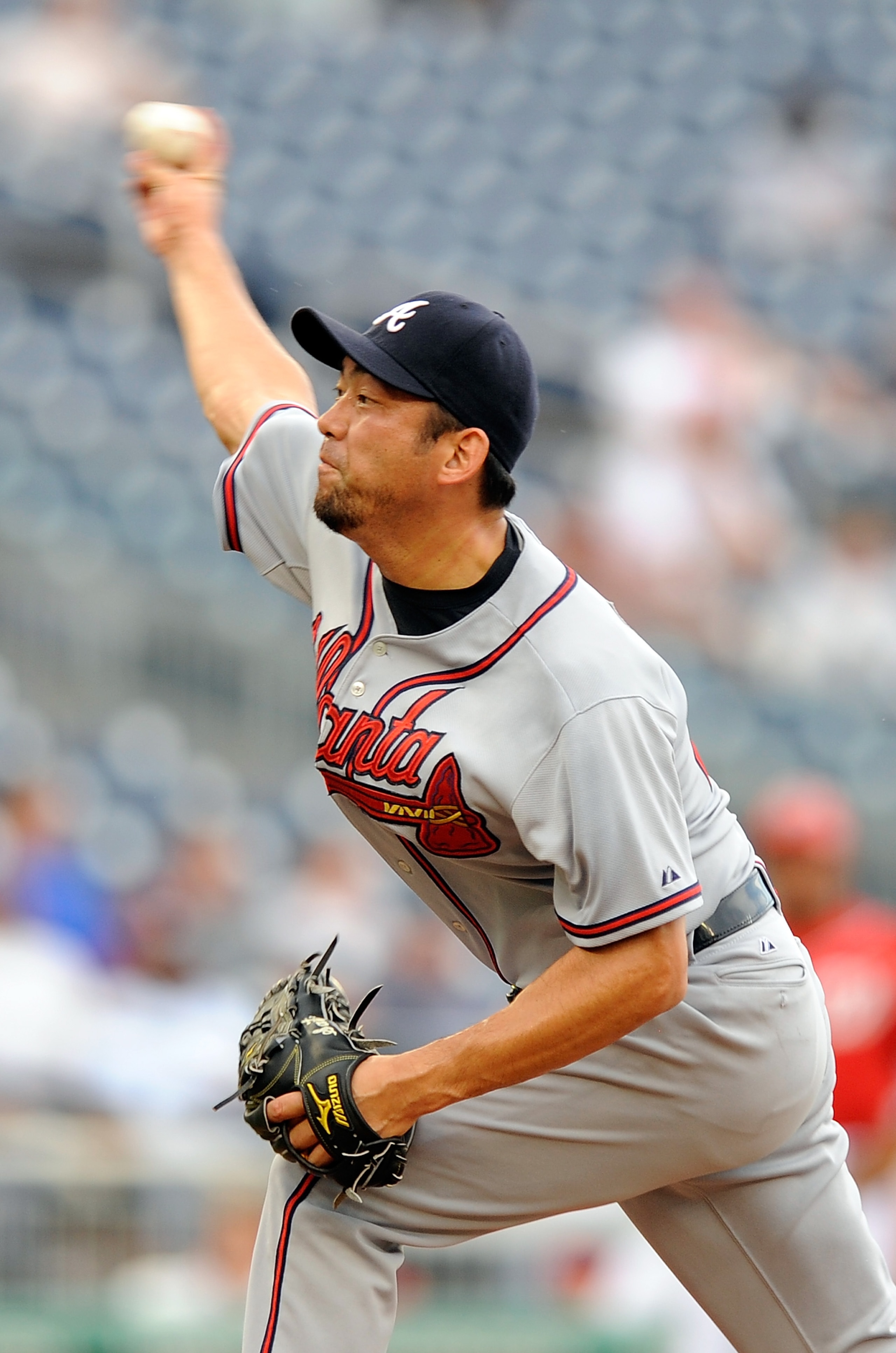 WASHINGTON - JULY 29:  Takashi Saito #40 of the Atlanta Braves pitches against the Washington Nationals at Nationals Park on July 29, 2010 in Washington, DC.  (Photo by Greg Fiume/Getty Images)