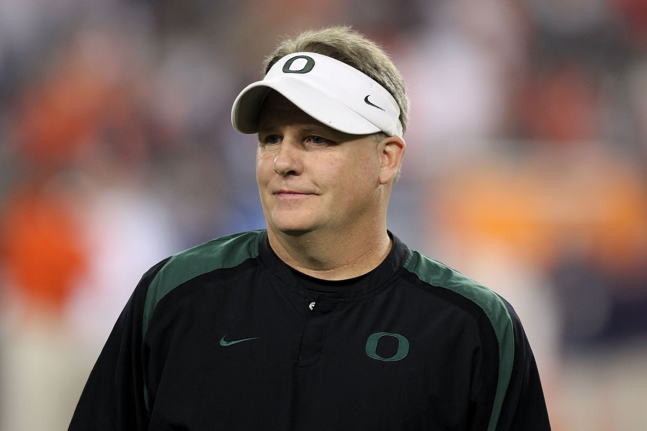GLENDALE, AZ - JANUARY 10:  Head coach Chip Kelly of the Oregon Ducks looks on during their 22-19 loss to the Auburn Tigers during the Tostitos BCS National Championship Game at University of Phoenix Stadium on January 10, 2011 in Glendale, Arizona.  (Pho