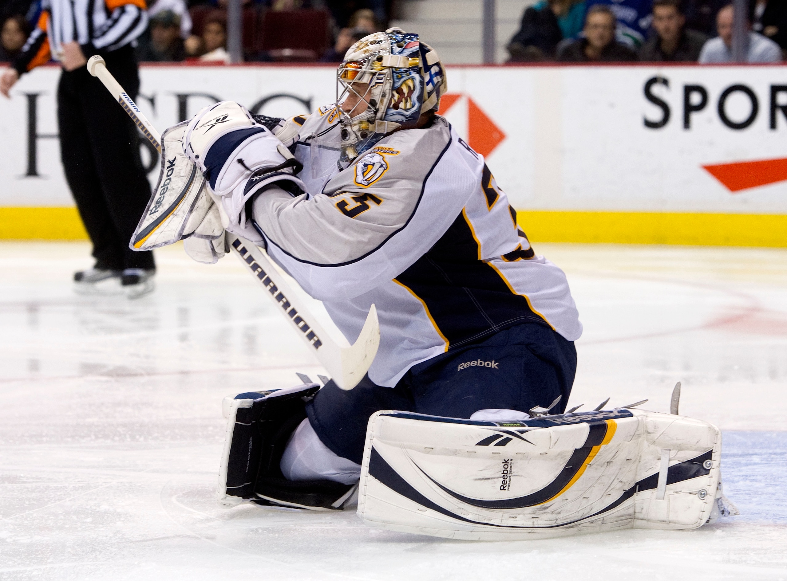 VANCOUVER, CANADA - JANUARY 26: Goalie Pekka Rinne #35 of the Nashville Predators hangs onto the puck after making a blocker save against the Vancouver Canucks during the second period in NHL action on January 26, 2011 at Rogers Arena in Vancouver, Britis