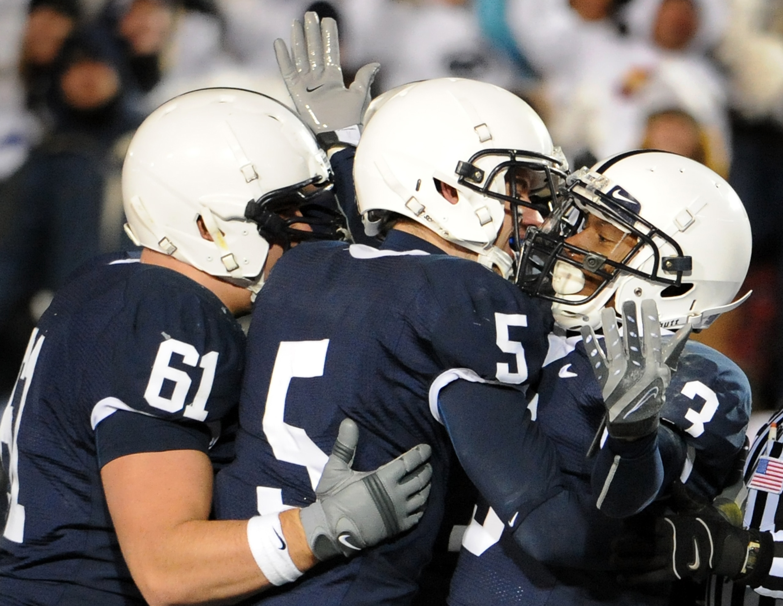 STATE COLLEGE, PA - NOVEMBER 22:  Deon Butler #3 of the Penn State Nittany Lions celebrates his touchdown with Graham Zug #5 and Stefen Wisniewski #61 against the Michigan State Spartans on November 22, 2008 at Beaver Stadium in State College, Pennsylvani