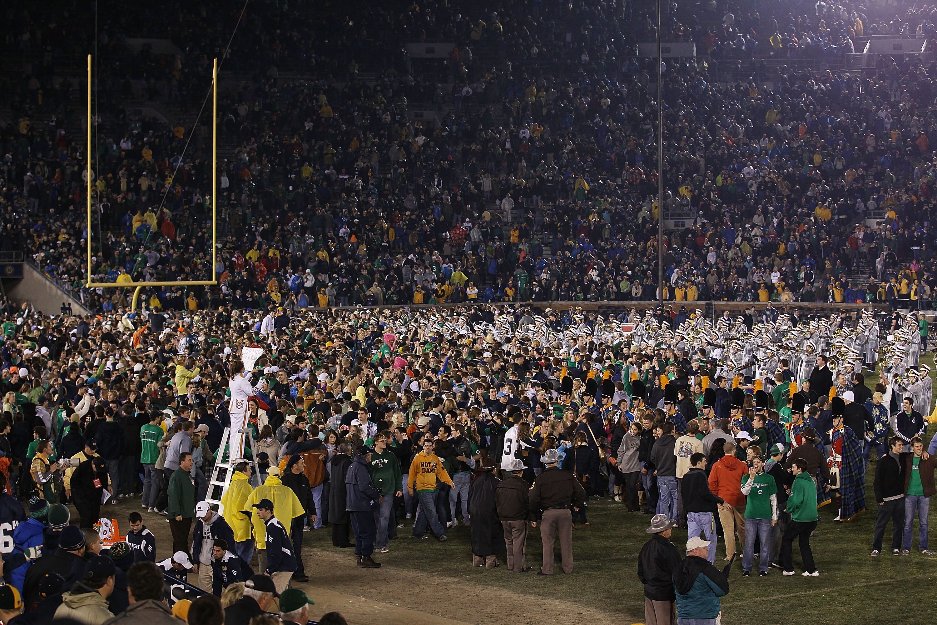 SOUTH BEND, IN - NOVEMBER 13: Fans stream onto the field after the Notre Dame Fighting Irish beat the Utah Utes at Notre Dame Stadium on November 13, 2010 in South Bend, Indiana. Notre Dame defeated Utah 28-3. (Photo by Jonathan Daniel/Getty Images)