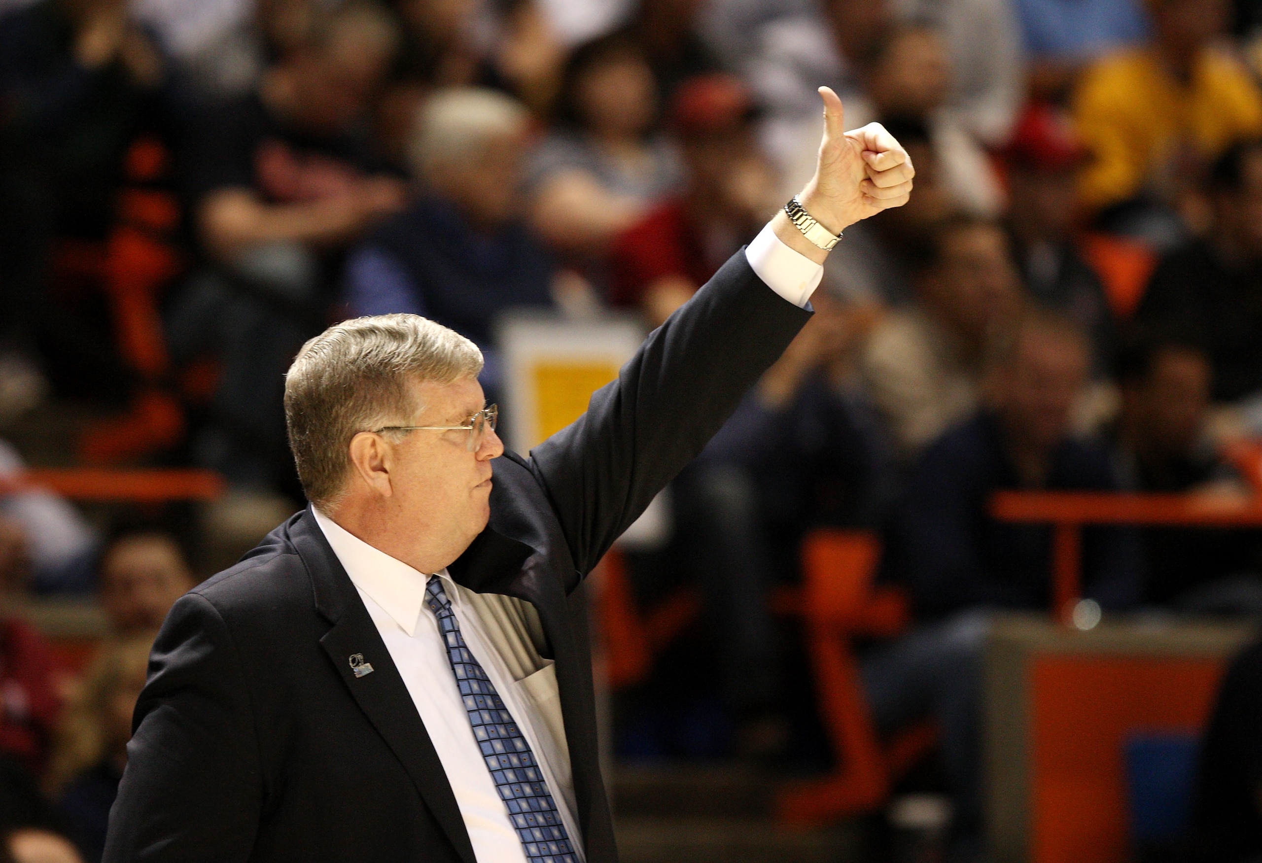 BOISE, ID - MARCH 20: Head Coach Stew Morrill of the Utah State Aggies adjusts his team during the game against the Marquette Golden Eagles in the first round of the NCAA Division I Men's Basketball Tournament at the Taco Bell Arena on March 20, 2009 in BOISE, ID - MARCH 20: Head Coach Stew Morrill of the Utah State Aggies adjusts his team during the game against the Marquette Golden Eagles in the first round of the NCAA Division I Men's Basketball Tournament at the Taco Bell Arena on March 20, 2009 in