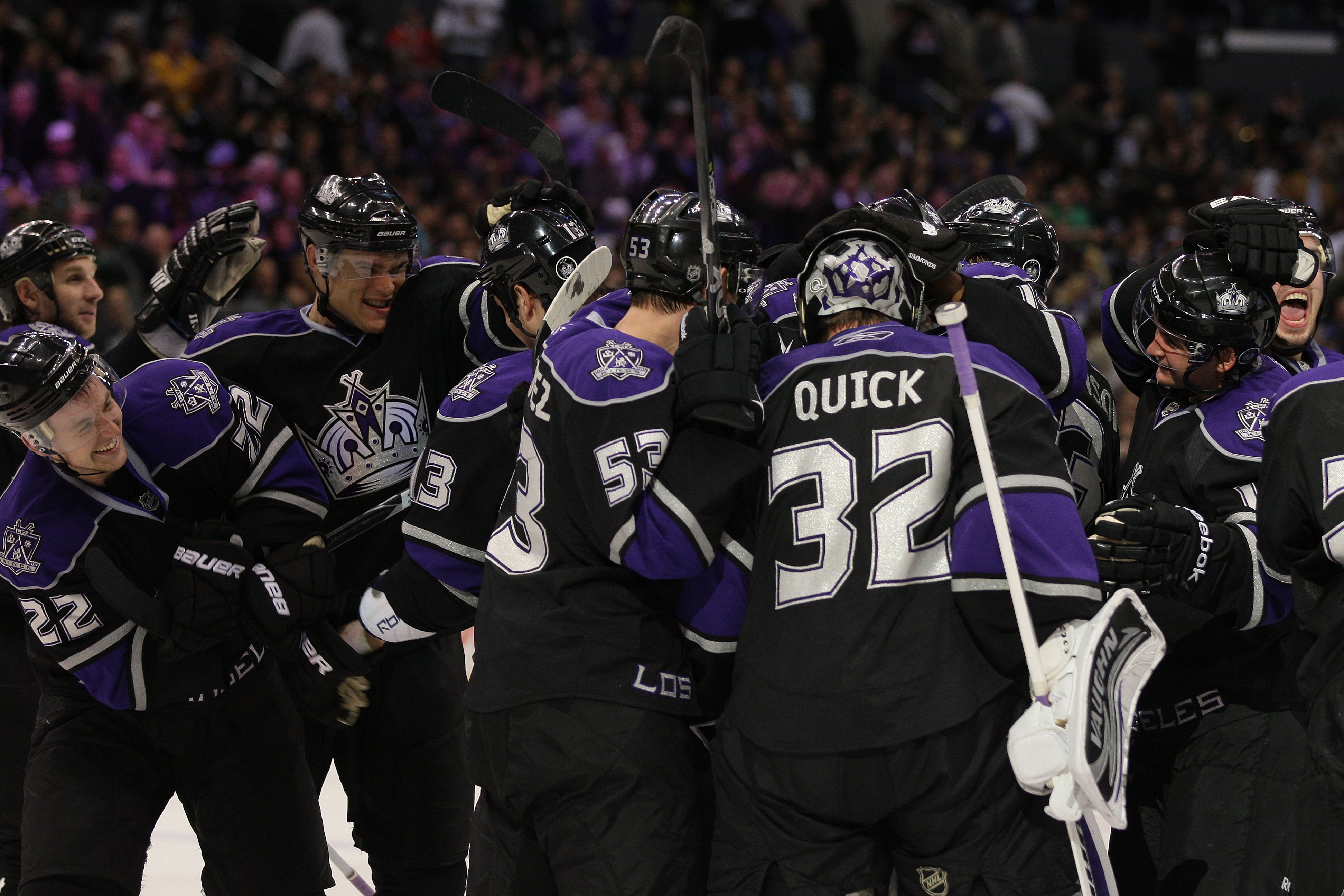 LOS ANGELES, CA - JANUARY 26:  Jonathan Quick #32 of the Los Angeles Kings celebrates with teammates after defeating the San Jose Sharks 3-2 in an overtime shootout at Staples Center on January 26, 2011 in Los Angeles, California.  (Photo by Victor Decolo