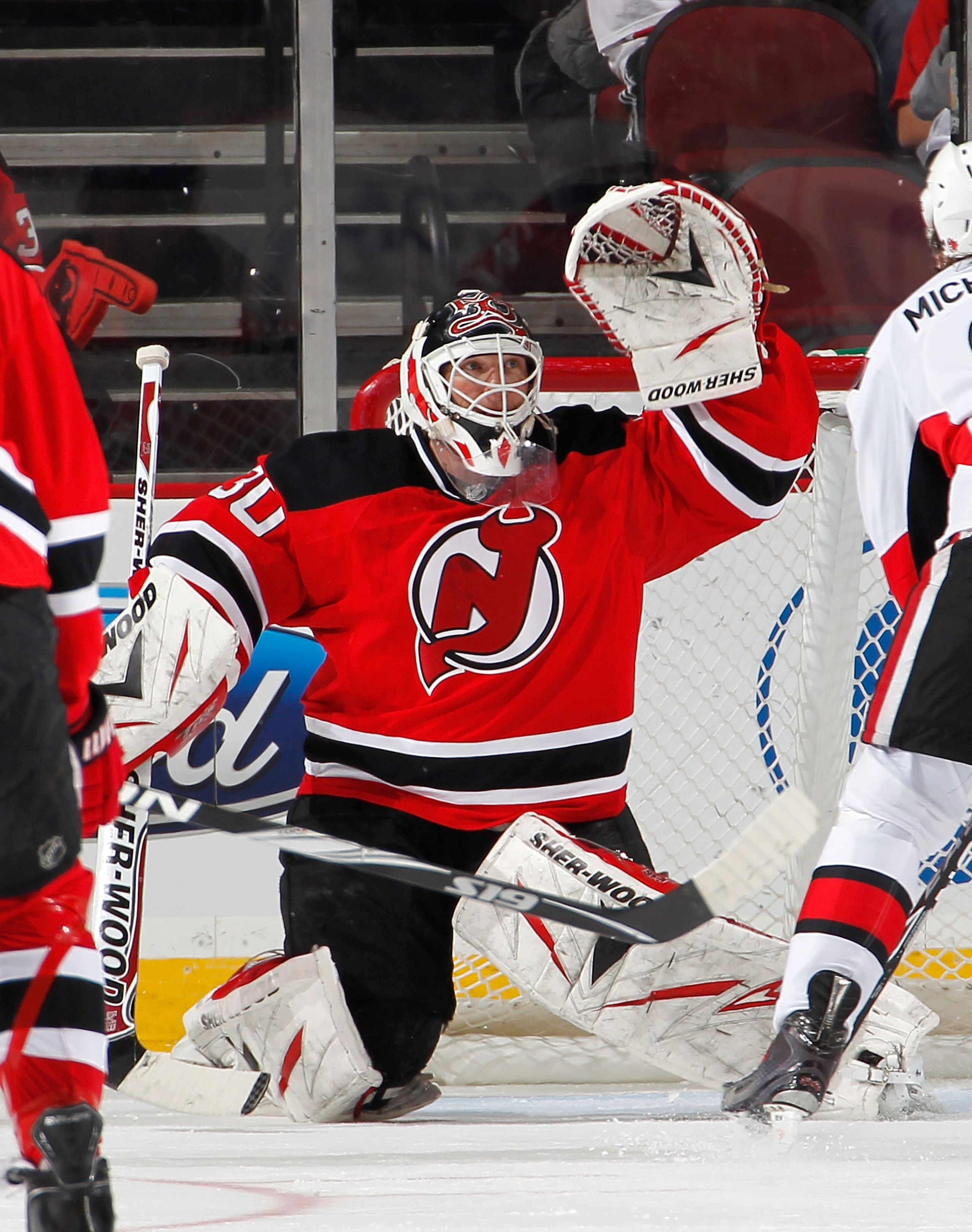 NEWARK, NJ - FEBRUARY 01:  Goalie Martin Brodeur #30 of the New Jersey Devils makes a save during an NHL hockey game against the Ottawa Senators at the Prudential Center on February 1, 2011 in Newark, New Jersey.  (Photo by Paul Bereswill/Getty Images)
