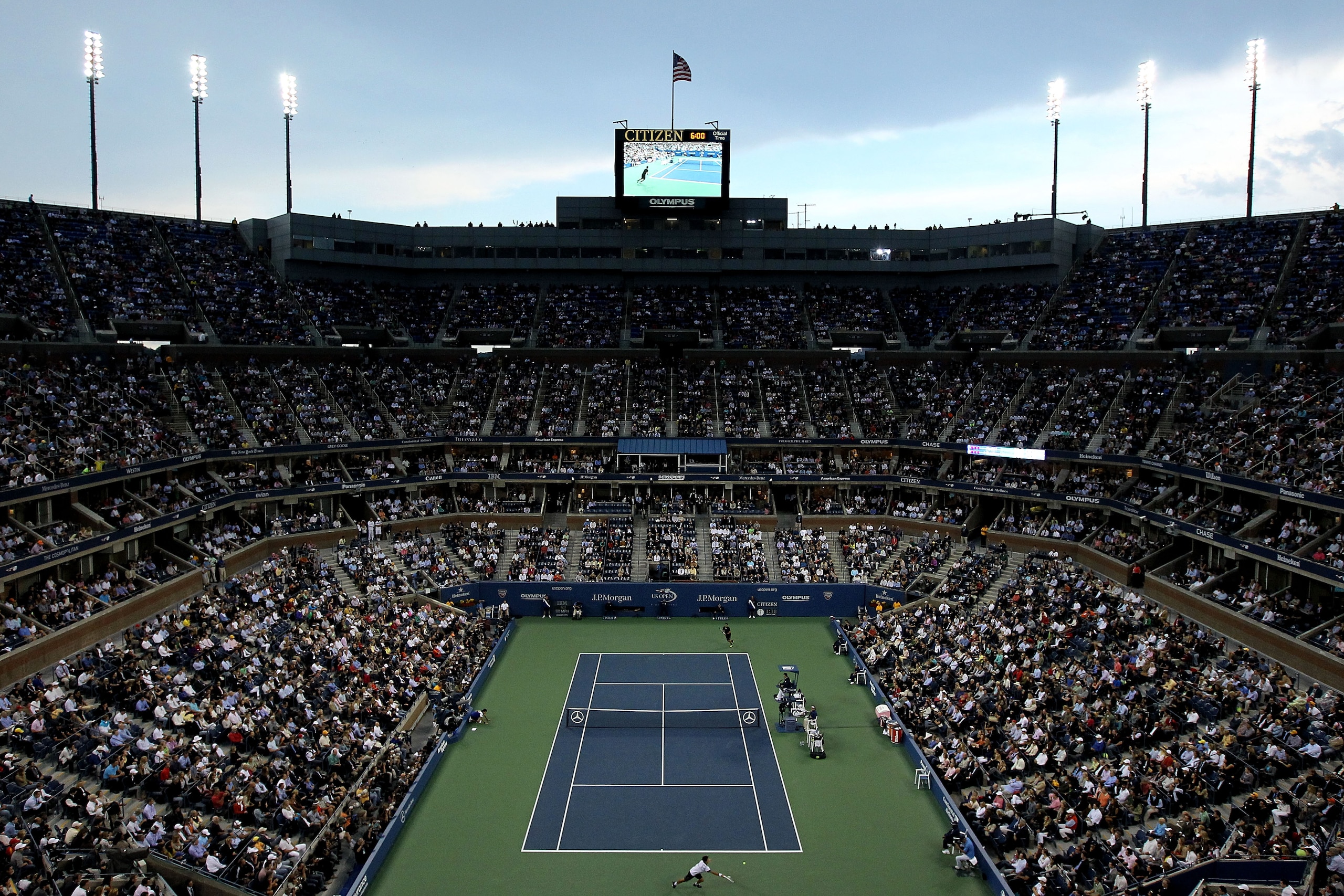 NEW YORK - SEPTEMBER 13:  Novak Djokovic of Serbia returns a shot against Rafael Nadal of Spain during his men's singles final match on day fifteen of the 2010 U.S. Open at the USTA Billie Jean King National Tennis Center on September 13, 2010 in the Flus