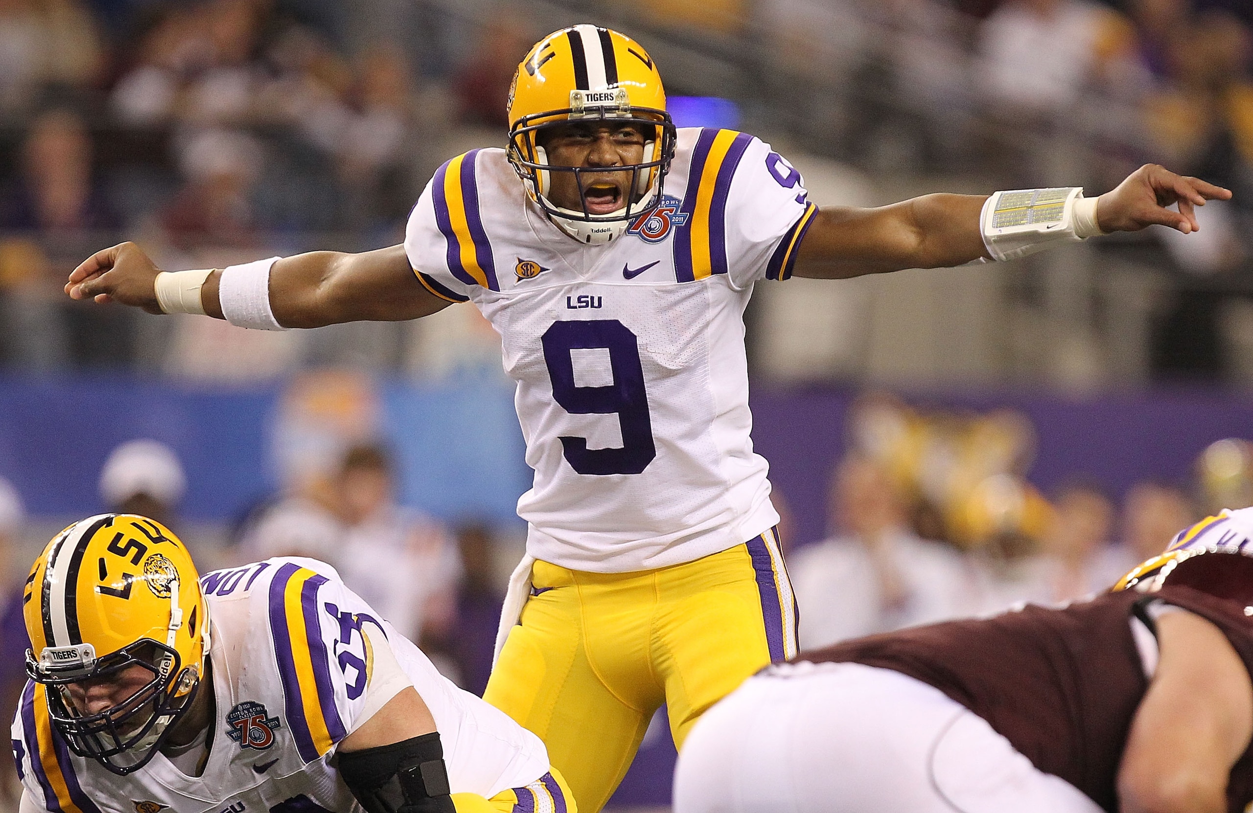 ARLINGTON, TX - JANUARY 07:  Quarterback Jordan Jefferson #9 of the LSU Tigers call a play against the Texas A&M Aggies during the AT&T Cotton Bowl at Cowboys Stadium on January 7, 2011 in Arlington, Texas.  (Photo by Ronald Martinez/Getty Images)