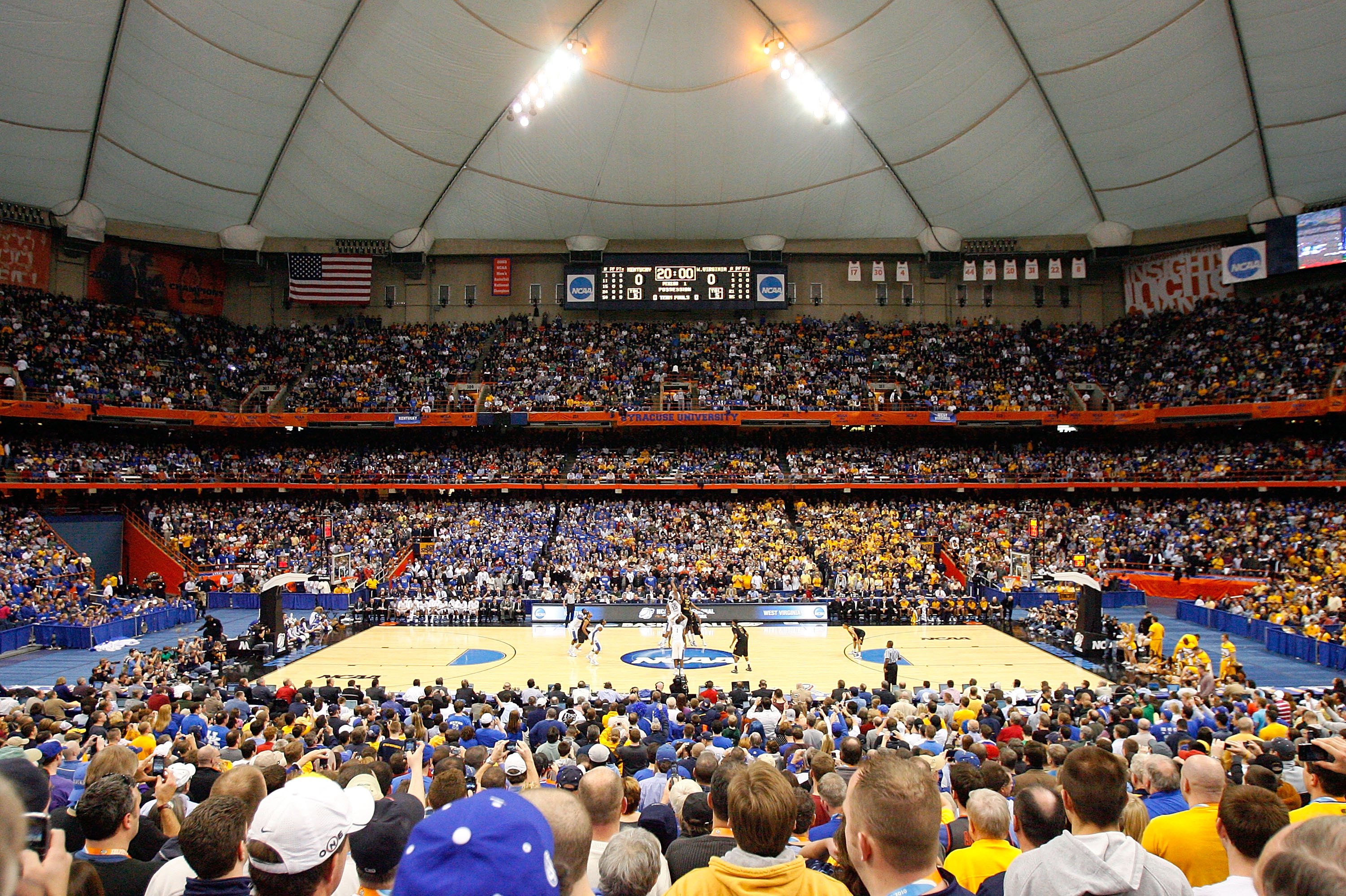 SYRACUSE, NY - MARCH 27: A general view of the opening tipoff between the Kentucky Wildcats and the West Virginia Mountaineers during the east regional final of the 2010 NCAA men's basketball tournament at the Carrier Dome on March 27, 2010 in Syracuse, SYRACUSE, NY - MARCH 27: A general view of the opening tipoff between the Kentucky Wildcats and the West Virginia Mountaineers during the east regional final of the 2010 NCAA men's basketball tournament at the Carrier Dome on March 27, 2010 in Syracuse,