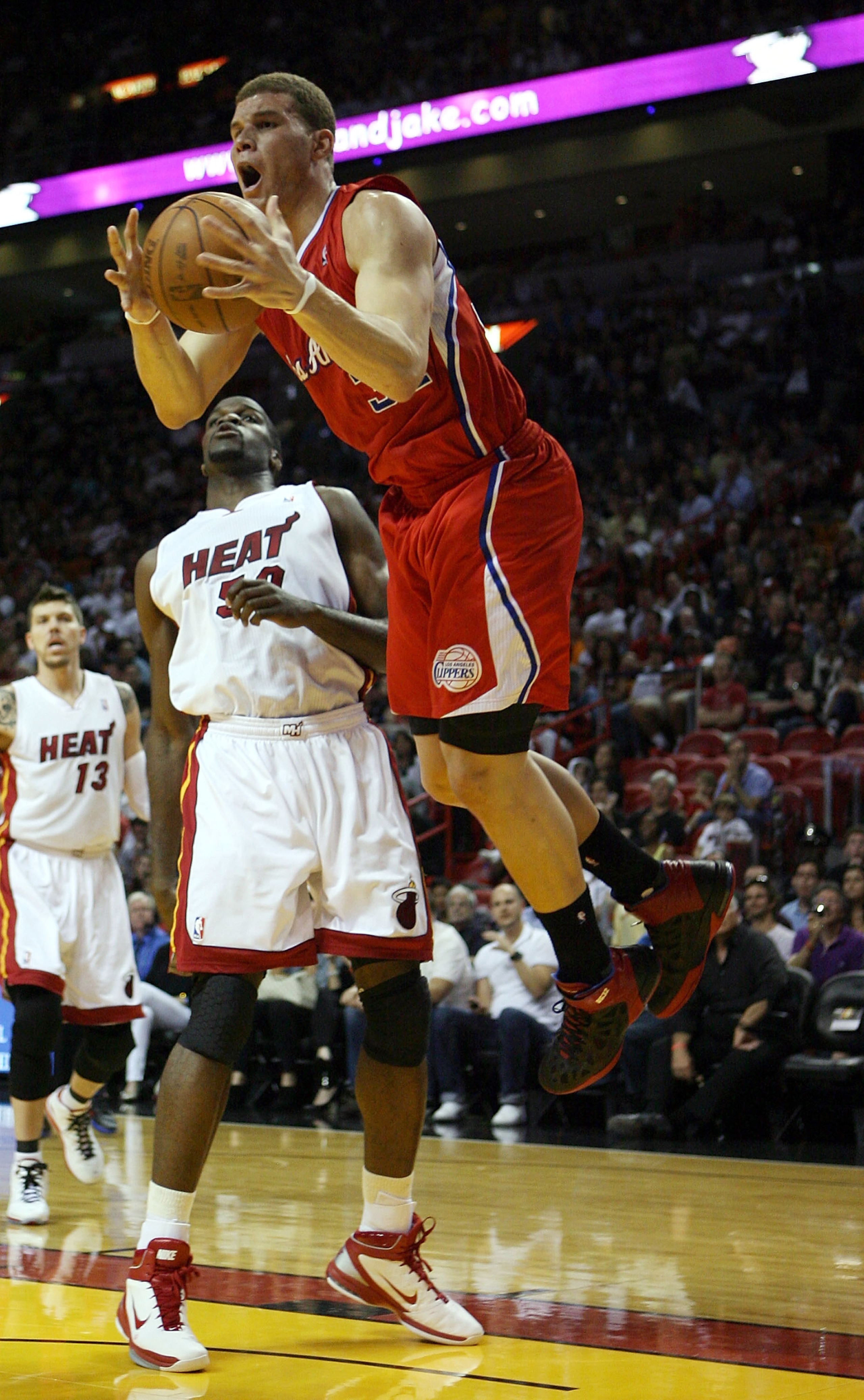 MIAMI, FL - FEBRUARY 06:  Forward Blake Griffin #32 of the  L.A. Clippers shoots over Center Joel Anthony #50 of the Miami Heat at American Airlines Arena on February 6, 2011 in Miami, Florida. Miami defeated the clippers 97-79. NOTE TO USER: User express