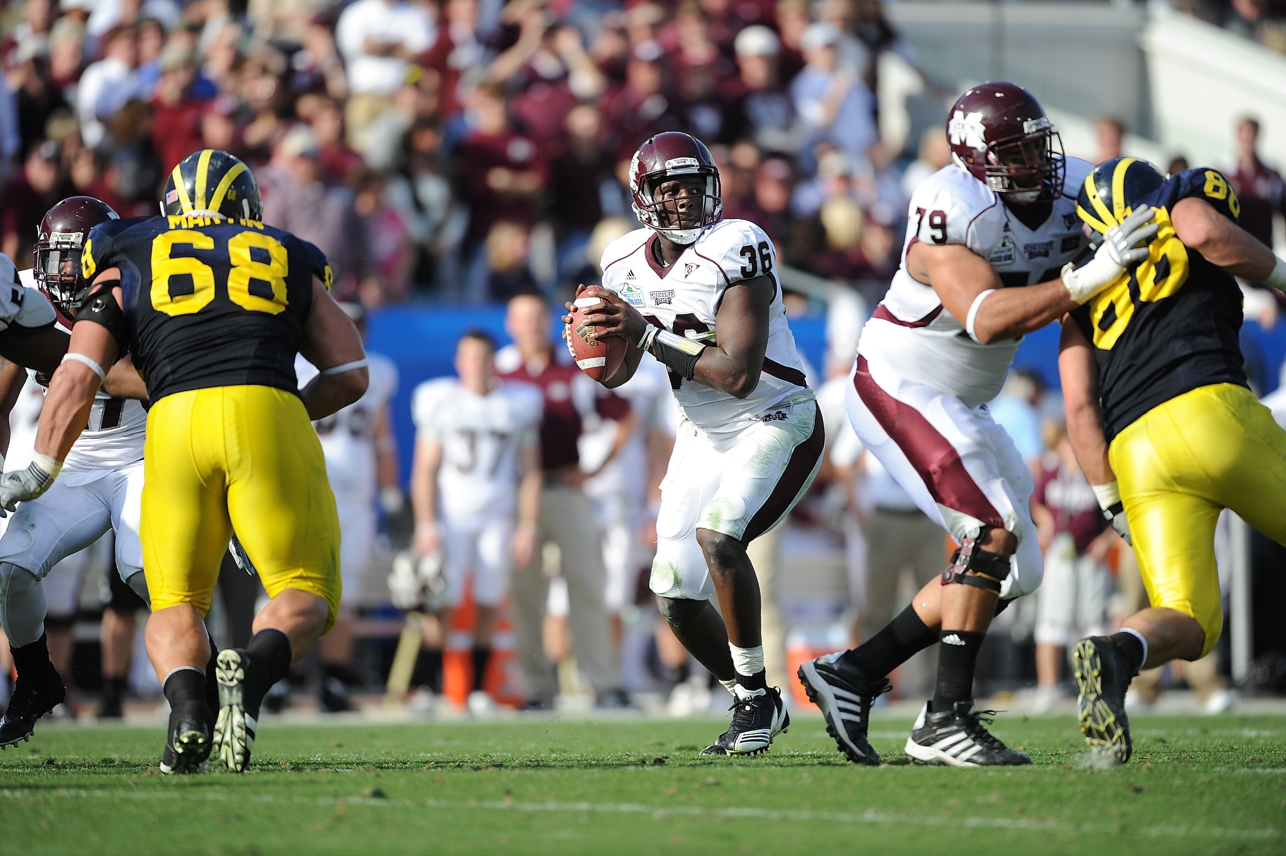 JACKSONVILLE, FL - JANUARY 01:  Quarterback Chris Relf #36 of the Mississippi State Bulldogs passes against the Michigan Wolverines during the Gator Bowl at EverBank Field on January 1, 2011 in Jacksonville, Florida  (Photo by Rick Dole/Getty Images)