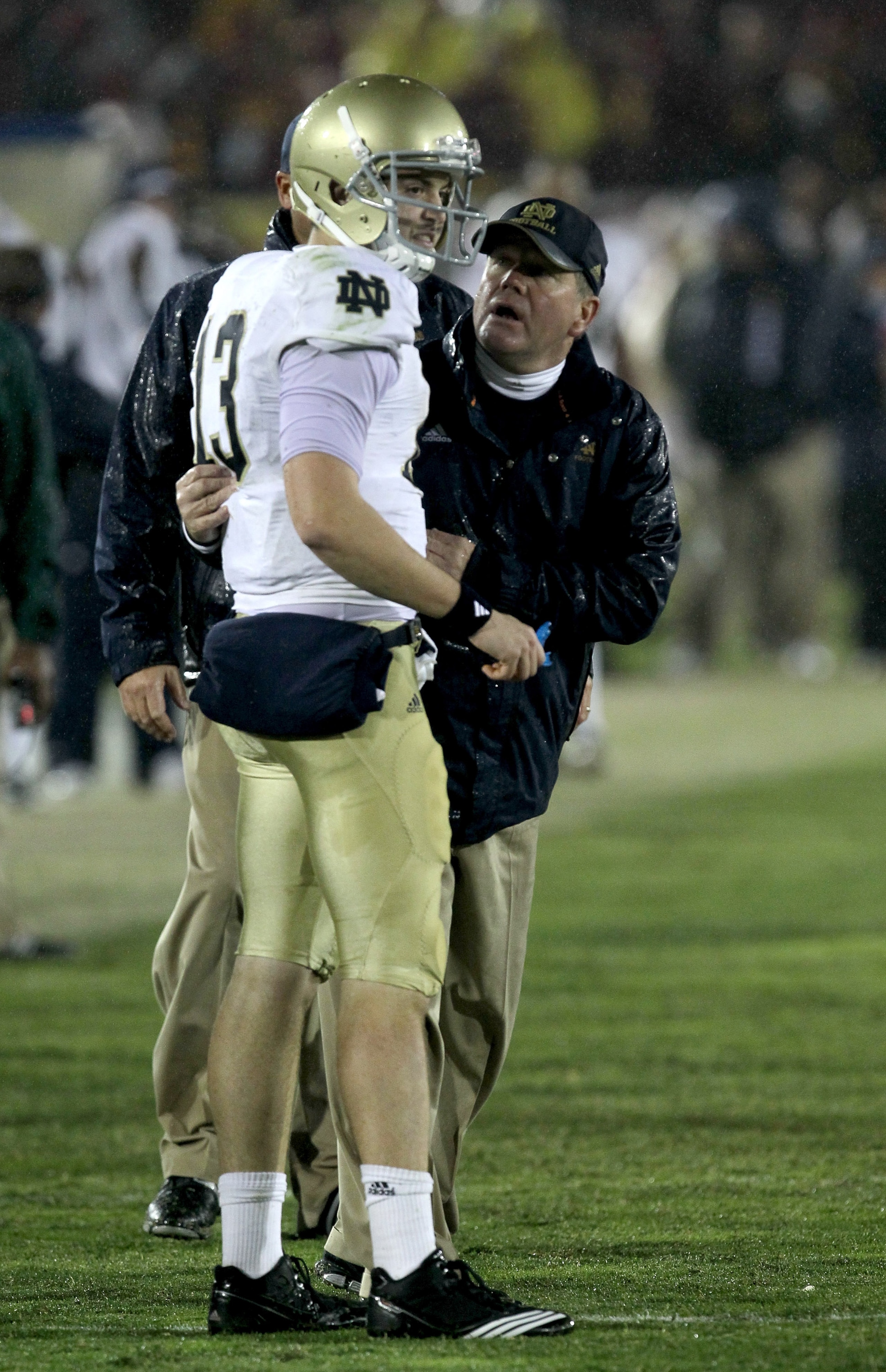 LOS ANGELES - NOVEMBER 27: Head coach Brian Kelly and quarterback Tommy Rees #13 of the Notre Dame Fighting Irish talk during the final clock killing possession in the fourth quarter against the USC Trojans at the Los Angeles Memorial Coliseum on November