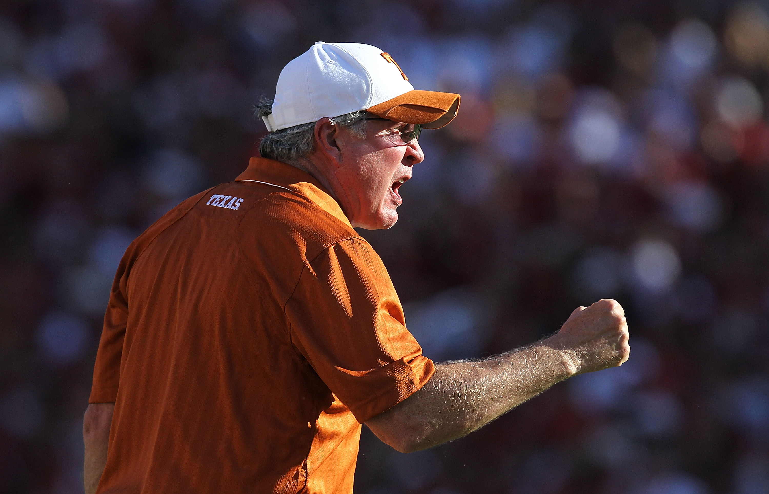 DALLAS - OCTOBER 02: Head coach Mack Brown of the Texas Longhorns yells on the sidelines during play against the Oklahoma Sooners at the Cotton Bowl on October 2, 2010 in Dallas, Texas. (Photo by Ronald Martinez/Getty Images)