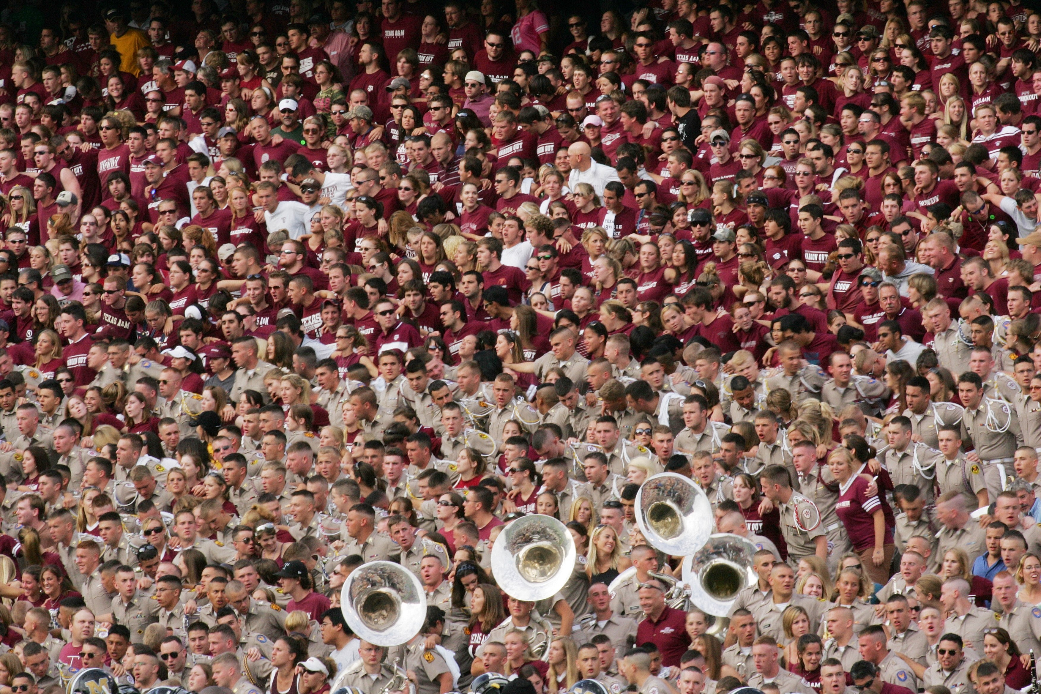 COLLEGE STATION, TX - OCTOBER 14:  Fans cheer during the Texas A&M Aggies game against the Missouri Tigers at Kyle Field on October 14, 2006 in College Station, Texas. Texas A&M won 25-19. (Photo by Ronald Martinez/Getty Images)