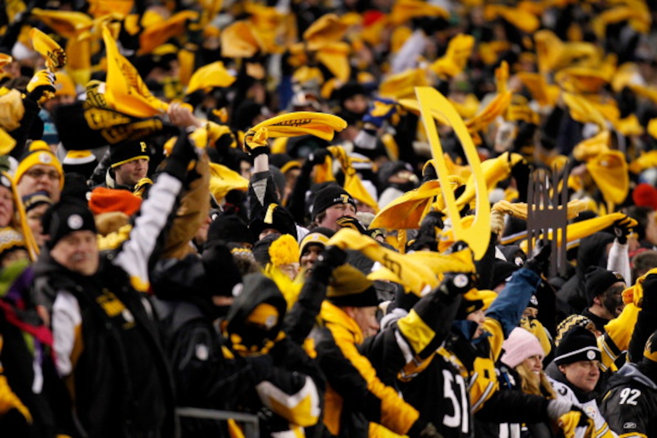 PITTSBURGH, PA - JANUARY 23:  Pittsburgh Steelers fans celebrate during their 24 to 19 win over the New York Jets during the 2011 AFC Championship game at Heinz Field on January 23, 2011 in Pittsburgh, Pennsylvania.  (Photo by Gregory Shamus/Getty Images)