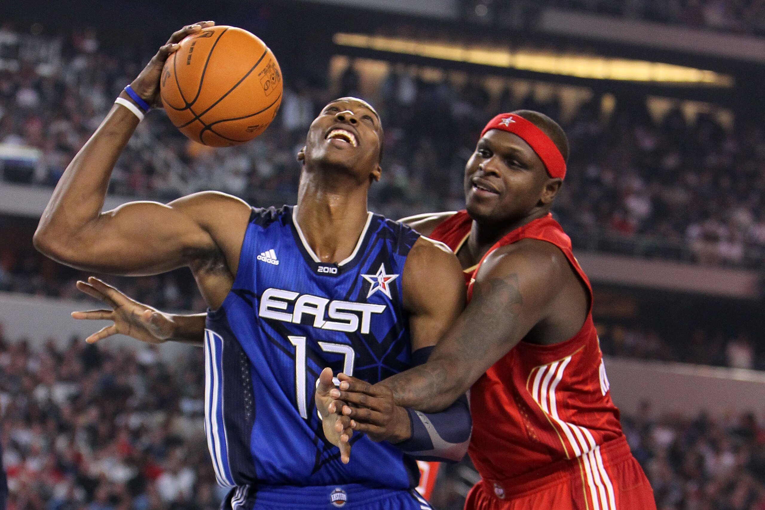 ARLINGTON, TX - FEBRUARY 14:  Dwight Howard #12 of the Eastern Conference smiles  while playing against Zach Randolph #50 of the Western Conference during the first half of the NBA All-Star Game, part of 2010 NBA All-Star Weekend at Cowboys Stadium on Feb