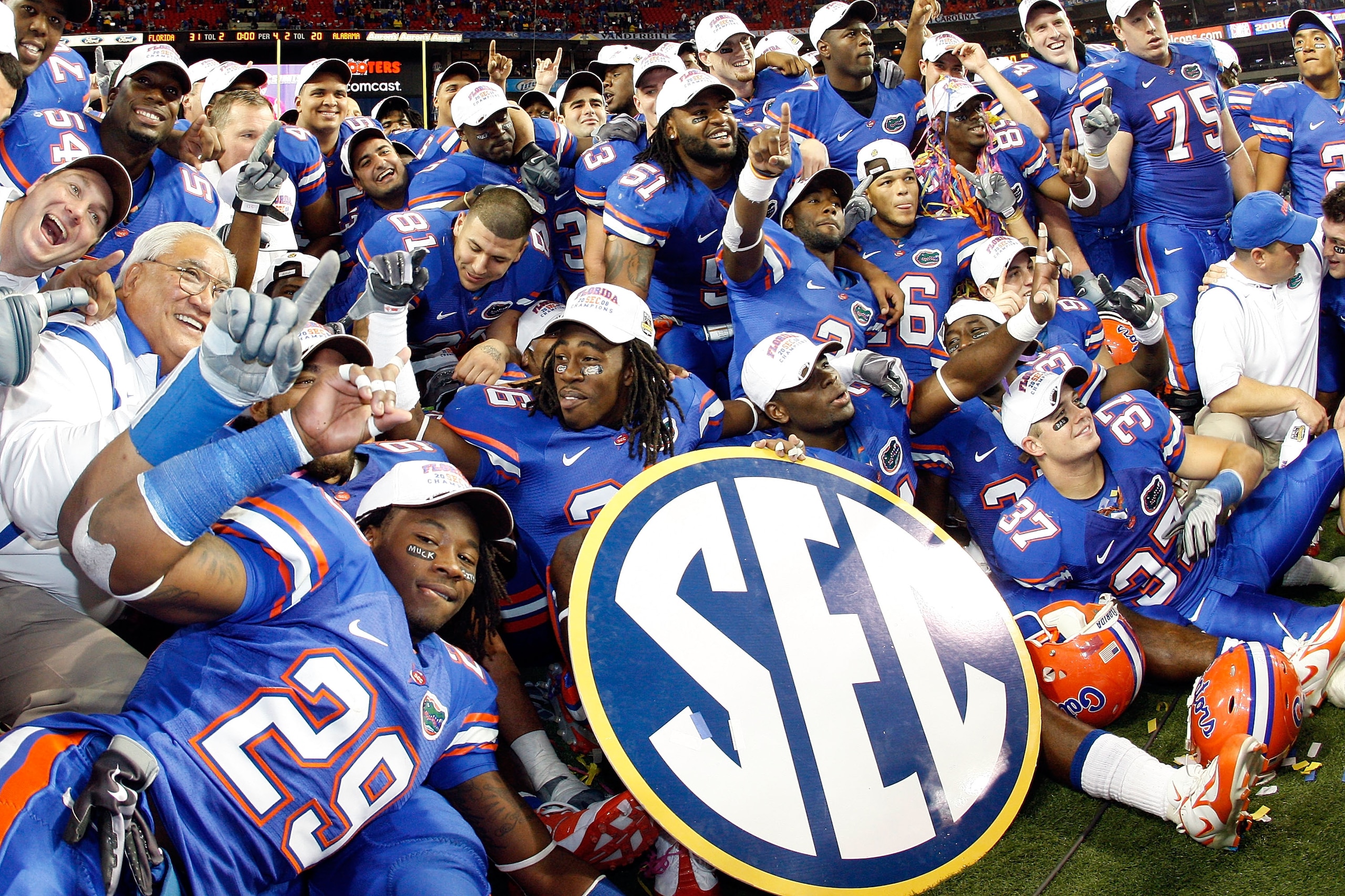 ATLANTA - DECEMBER 06:  Members of the Florida Gators celebrate their 31-20 win over the Alabama Crimson Tide to win the SEC Championship on December 6, 2008 at the Georgia Dome in Atlanta, Georgia.  (Photo by Chris Graythen/Getty Images)