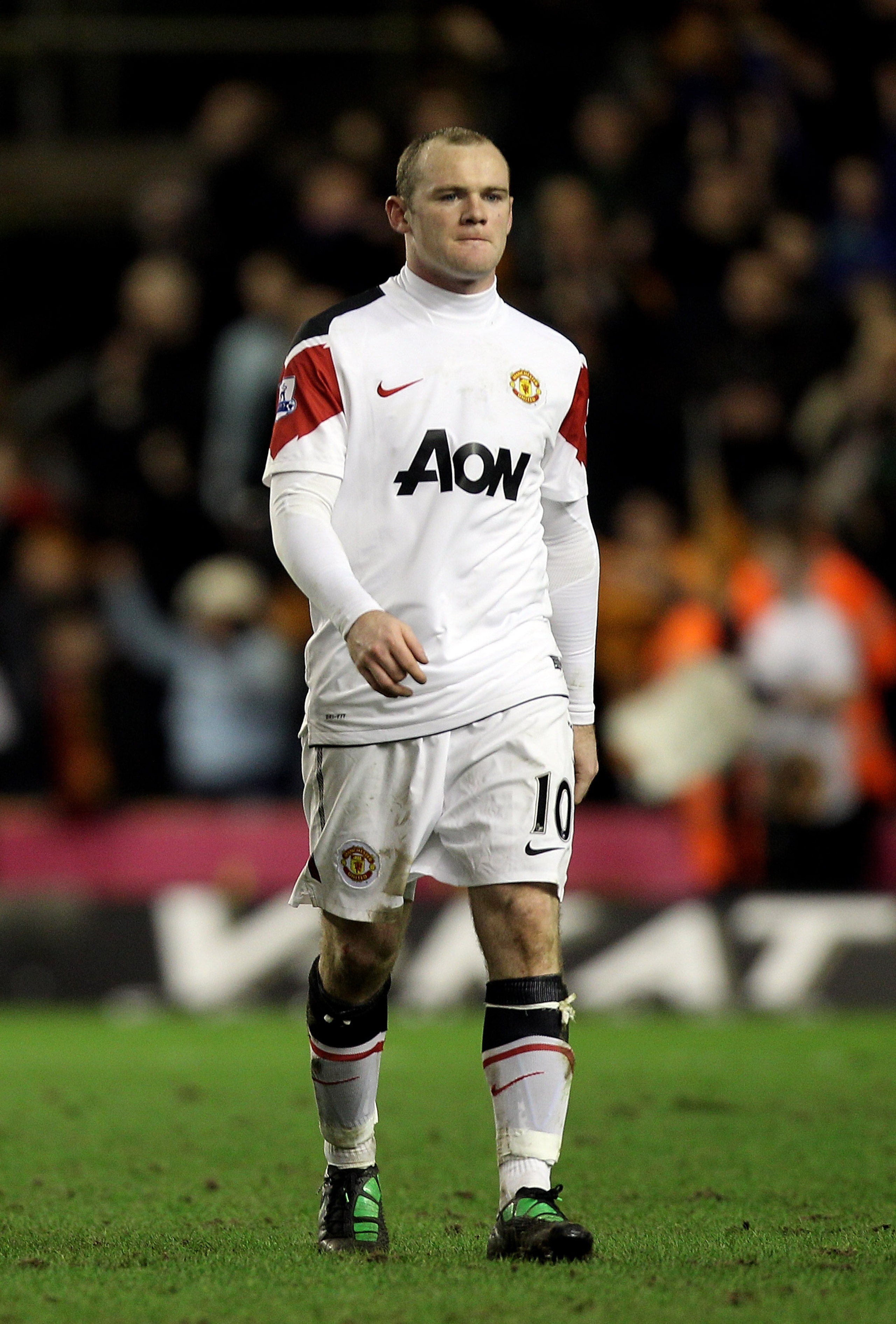 WOLVERHAMPTON, ENGLAND - FEBRUARY 05: Wayne Rooney of Manchester United leaves the pitch dejected after the Barclays Premier League match between Wolverhampton Wanderers and Manchester United at Molineux on February 5, 2011 in Wolverhampton, England.  (Ph