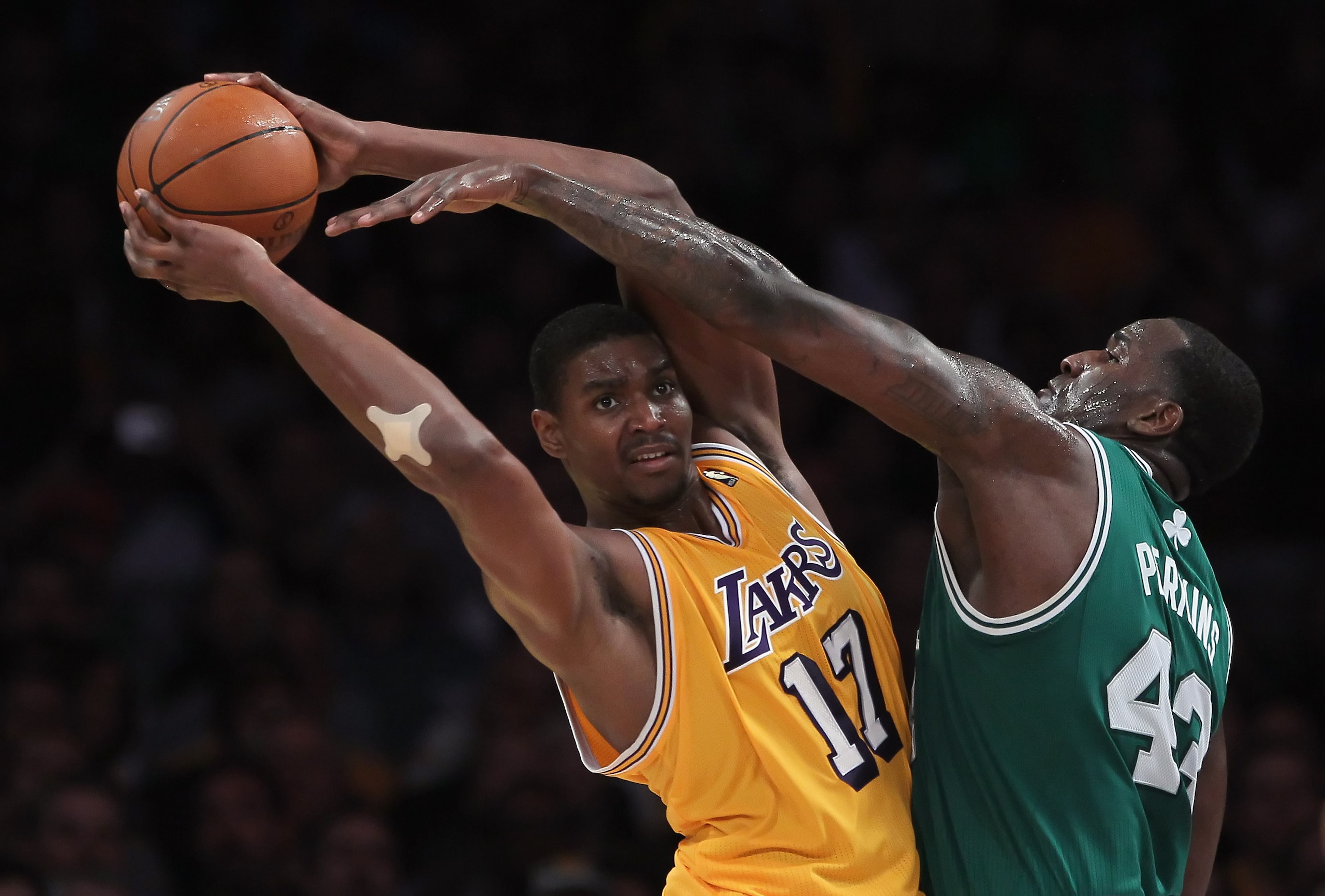 LOS ANGELES, CA - JANUARY 30: Andrew Bynum #17 of the Los Angeles Lakers is defended by Kendrick Perkins #43 of the Boston Celtics in the second half at Staples Center on January 30, 2011 in Los Angeles, California. The Celtics defeated the Lakers 109-96 LOS ANGELES, CA - JANUARY 30: Andrew Bynum #17 of the Los Angeles Lakers is defended by Kendrick Perkins #43 of the Boston Celtics in the second half at Staples Center on January 30, 2011 in Los Angeles, California. The Celtics defeated the Lakers 109-96