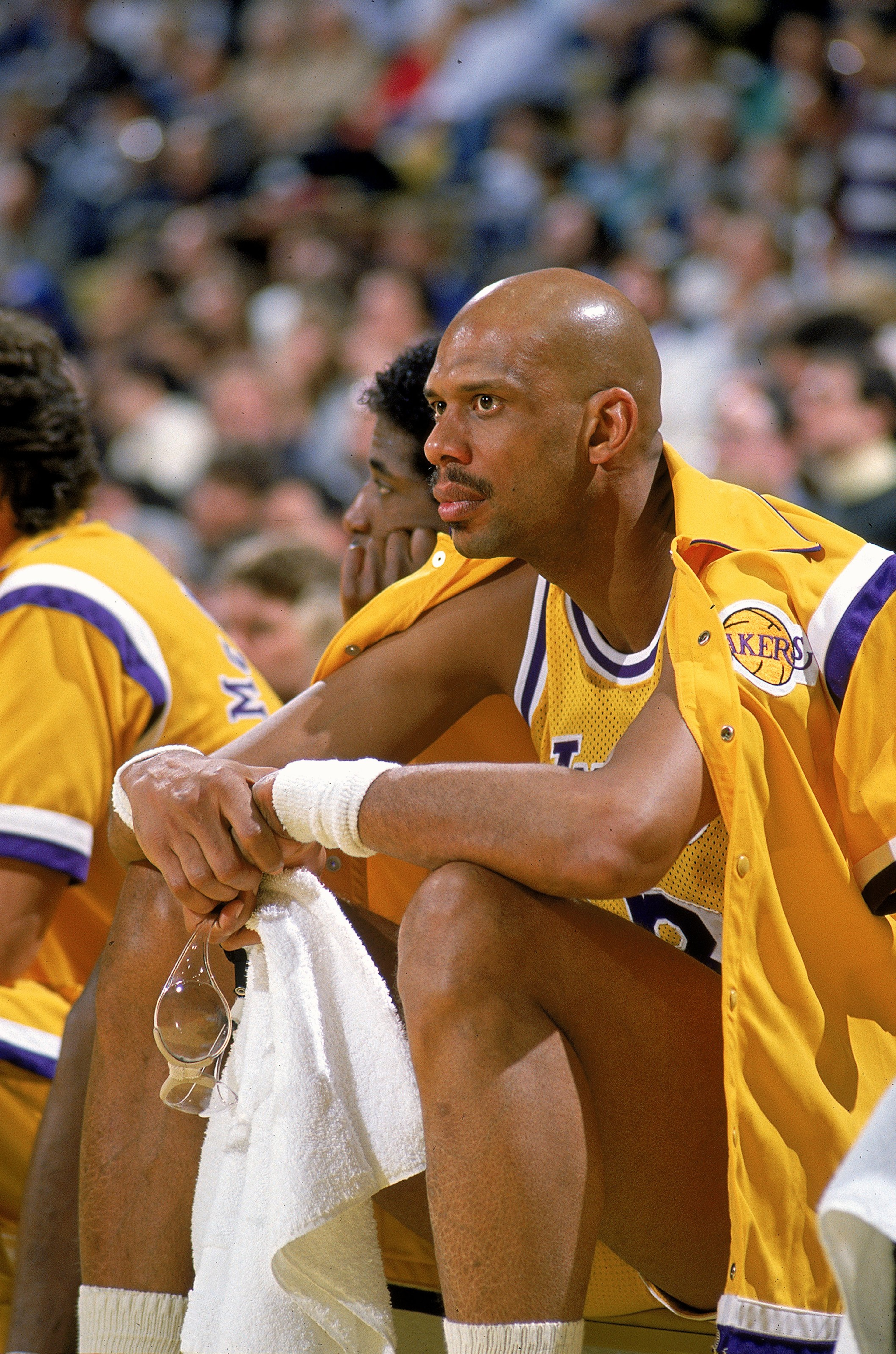1989: Kareem Abdul-Jabbar of the Los Angeles Lakers watches from the sidelines.  Mandatory Credit: Allen Dean Steele  /Allsport
