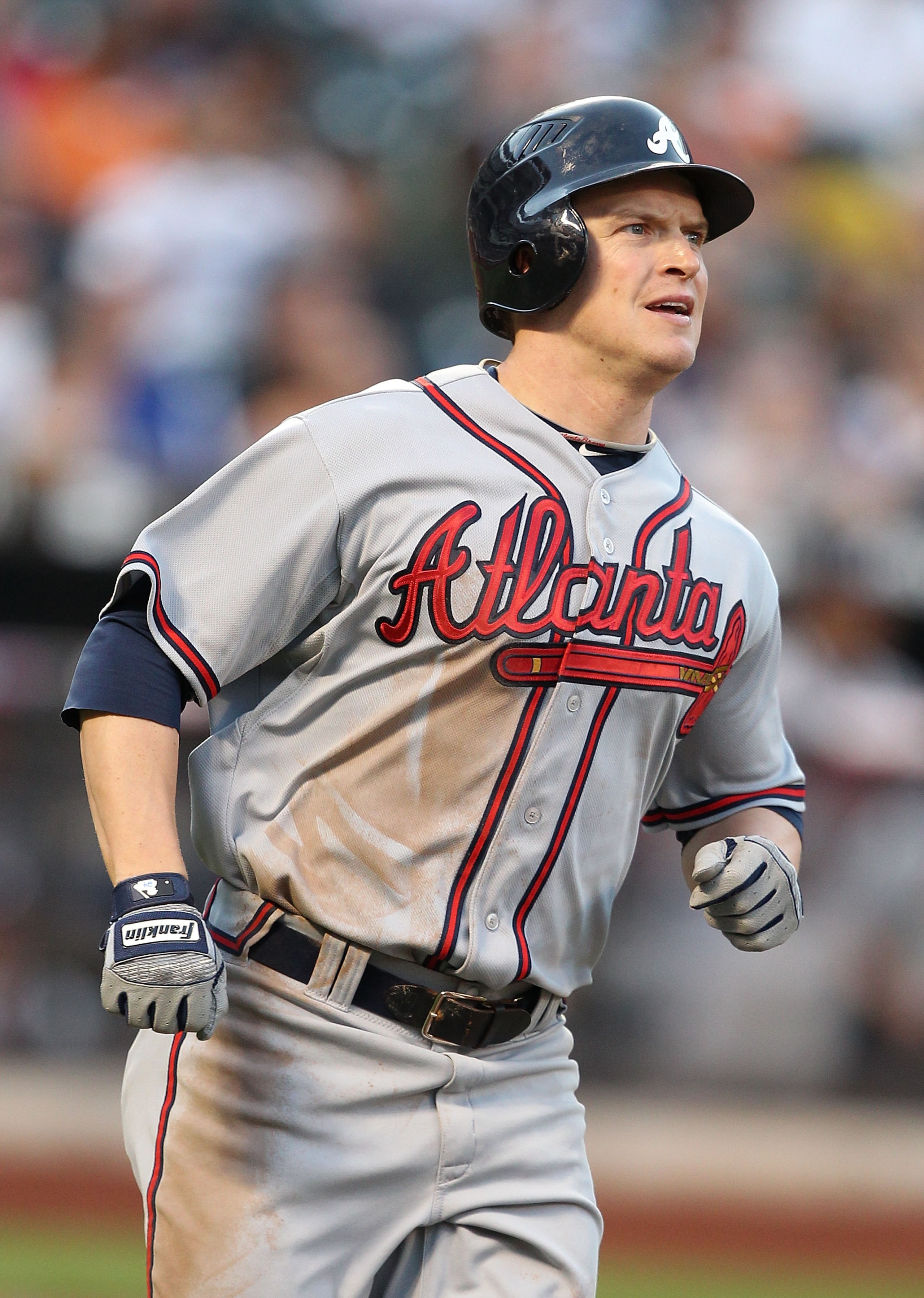 NEW YORK - SEPTEMBER 18:  Nate McLouth #24 of the Atlanta Braves rounds the bases after hitting a home run against  the New York Mets in the ninth inning of their game on September 18, 2010 at Citi Field in the Flushing neighborhood of the Queens borough