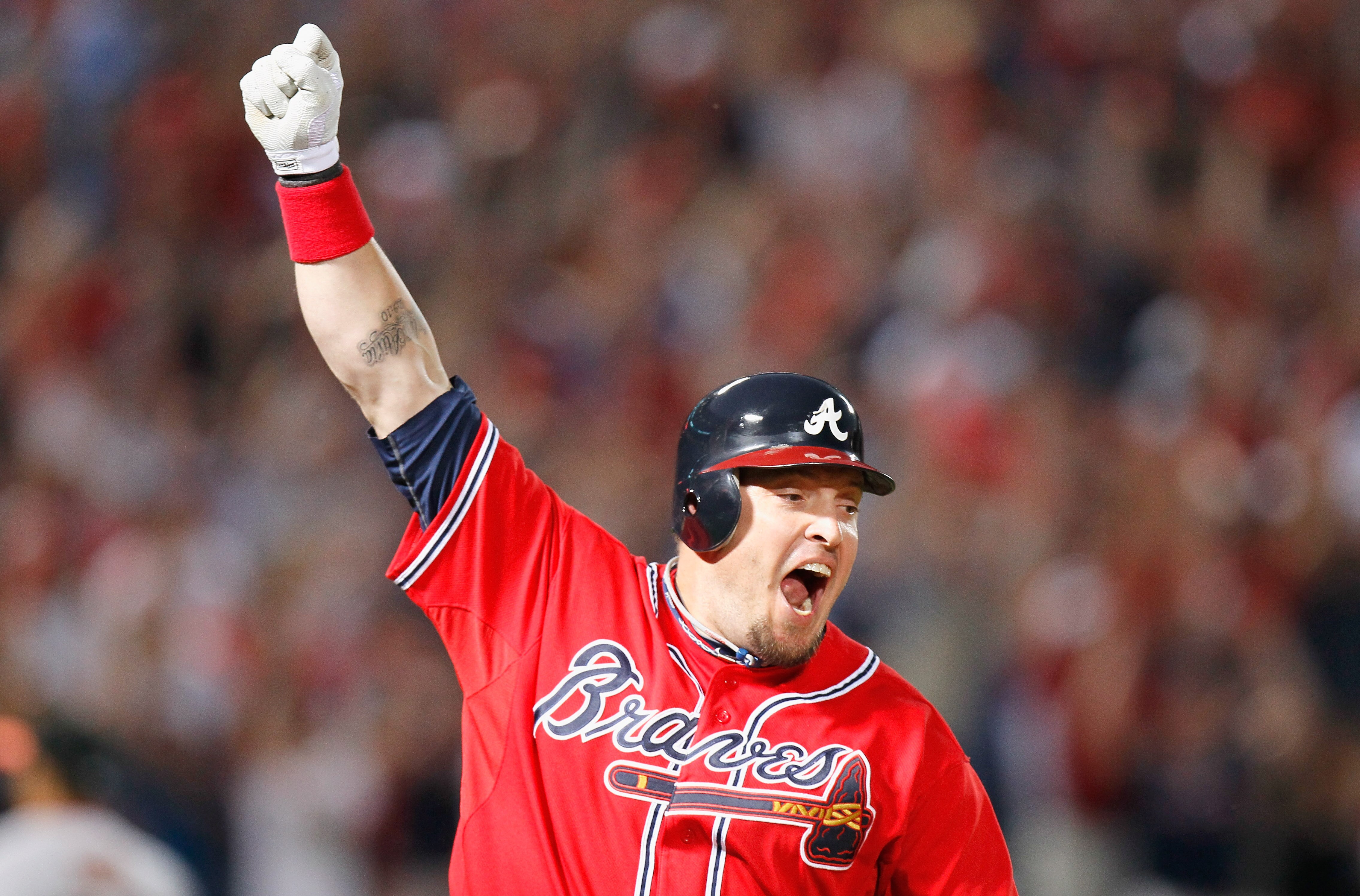ATLANTA - OCTOBER 10:  Eric Hinske #20 of the Atlanta Braves against the San Francisco Giants during Game Three of the NLDS of the 2010 MLB Playoffs at Turner Field on October 10, 2010 in Atlanta, Georgia.  (Photo by Kevin C. Cox/Getty Images)