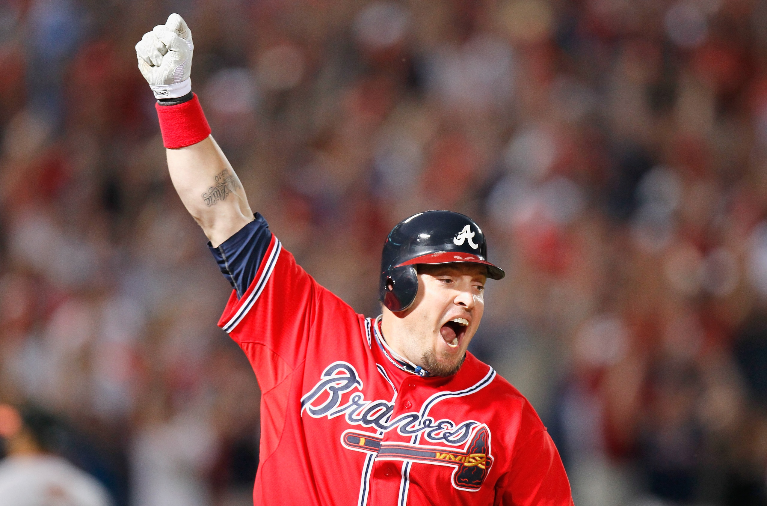 ATLANTA - OCTOBER 10:  Eric Hinske #20 of the Atlanta Braves against the San Francisco Giants during Game Three of the NLDS of the 2010 MLB Playoffs at Turner Field on October 10, 2010 in Atlanta, Georgia.  (Photo by Kevin C. Cox/Getty Images)