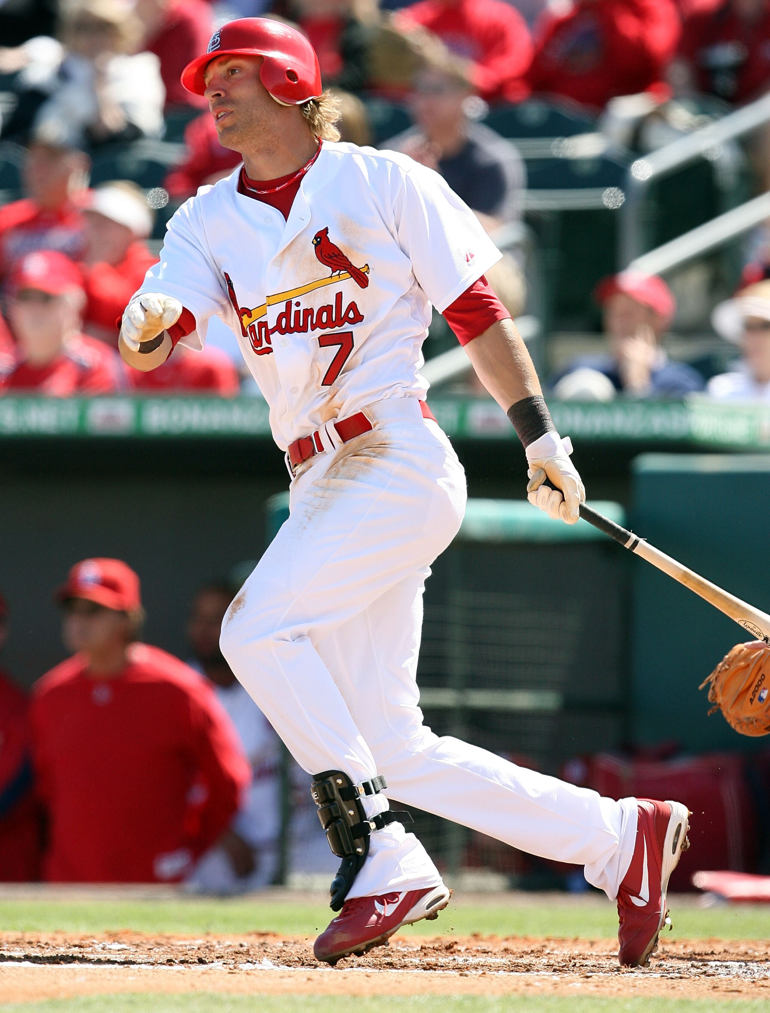 JUPITER, FL - MARCH 02:  Joe Mather #7 of the St. Louis Cardinals follows his fly ball to left field against the Tampa Bay Rays during a spring training game at Roger Dean Stadium on March 2, 2009 in Jupiter, Florida. The Rays defeated the Cardinals 8-5.