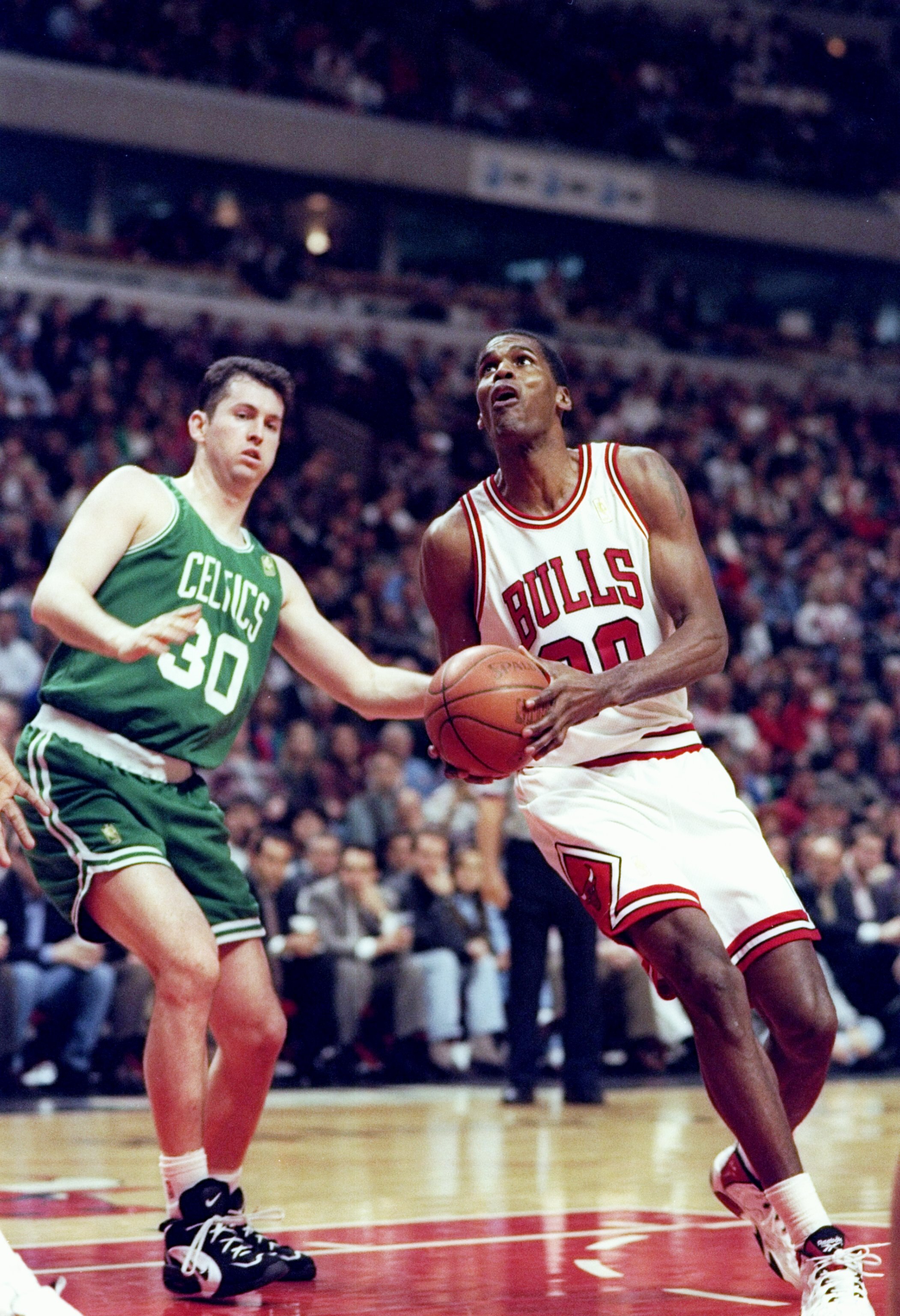1 Apr 1997:  Center Robert Parish of the Chicago Bulls (right) in action against Harry Conlon of the Boston Celtics during a game at the United Center in Chicago, Illinois.  The Bulls won the game 111-106. Mandatory Credit: Jonathan Daniel  /Allsport