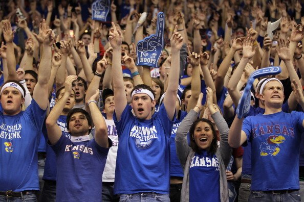 LAWRENCE, KS - FEBRUARY 07:  Kansas Jayhawks fans cheer during player introductions prior to the game against the Missouri Tigers on February 7, 2011 at Allen Fieldhouse in Lawrence, Kansas.  (Photo by Jamie Squire/Getty Images)