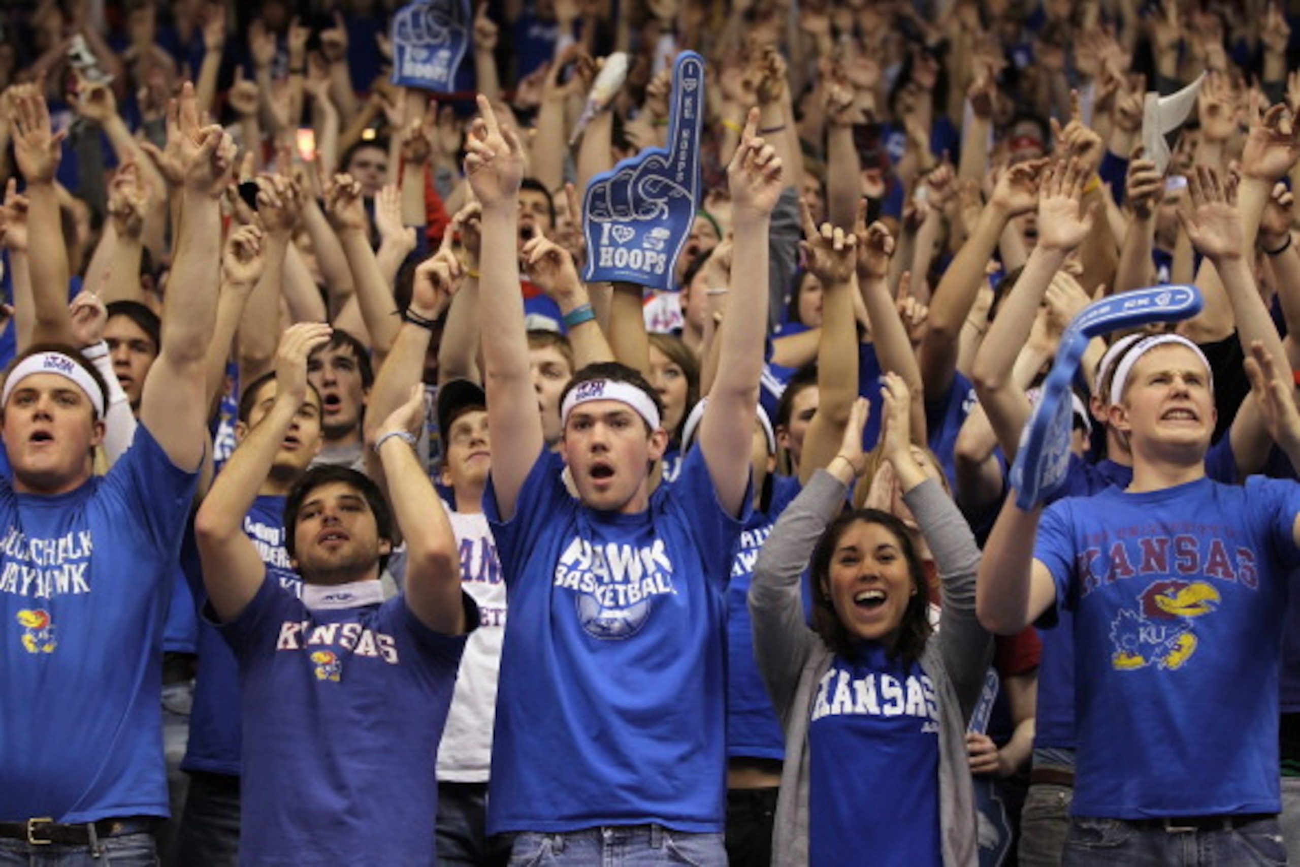 LAWRENCE, KS - FEBRUARY 07:  Kansas Jayhawks fans cheer during player introductions prior to the game against the Missouri Tigers on February 7, 2011 at Allen Fieldhouse in Lawrence, Kansas.  (Photo by Jamie Squire/Getty Images)