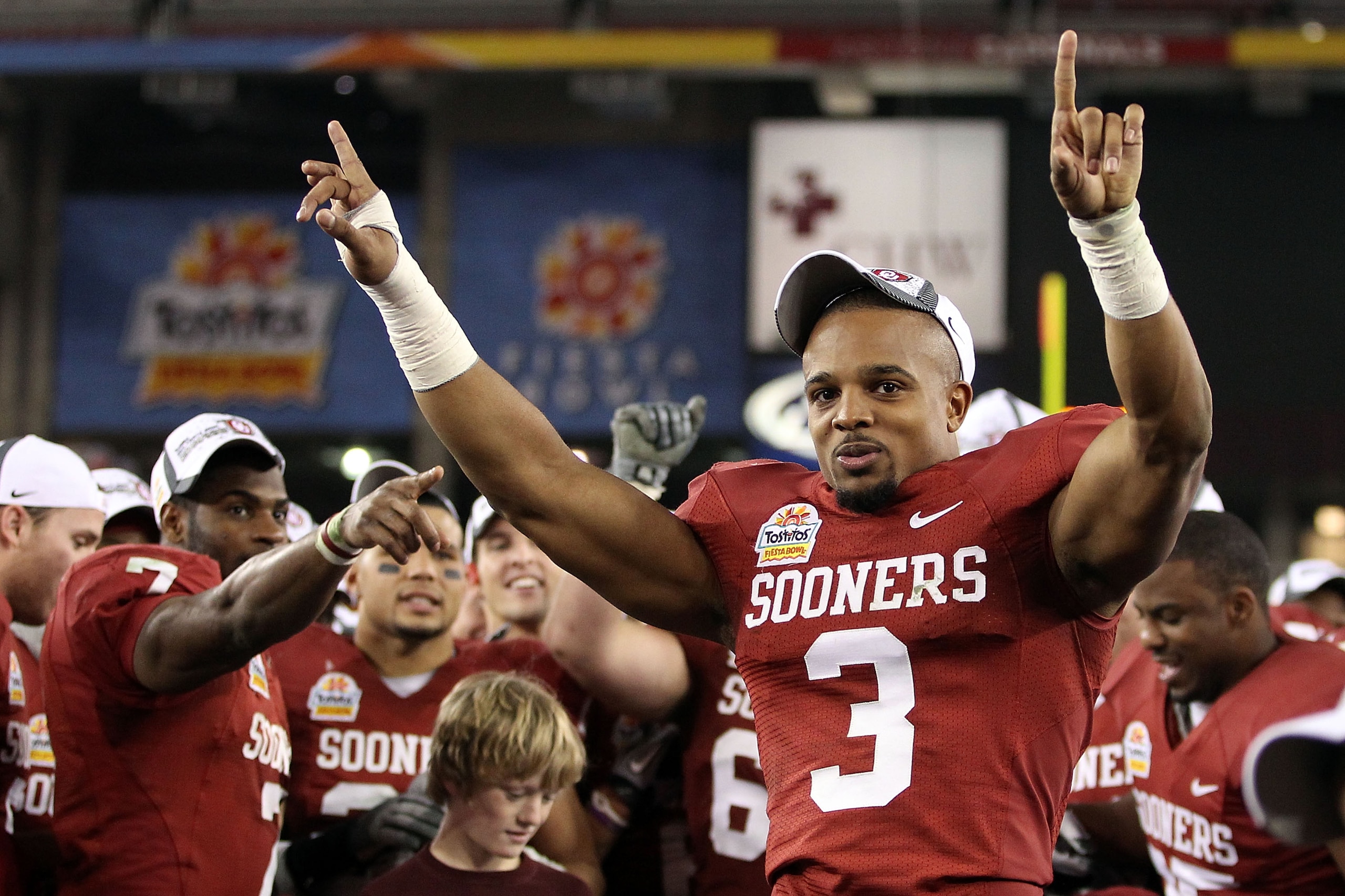 GLENDALE, AZ - JANUARY 01:  Jonathan Nelson #3 of the Oklahoma Sooners celebrates the Sooners 48-20 victory against the Connecticut Huskies during the Tostitos Fiesta Bowl at the Universtity of Phoenix Stadium on January 1, 2011 in Glendale, Arizona.  (Ph