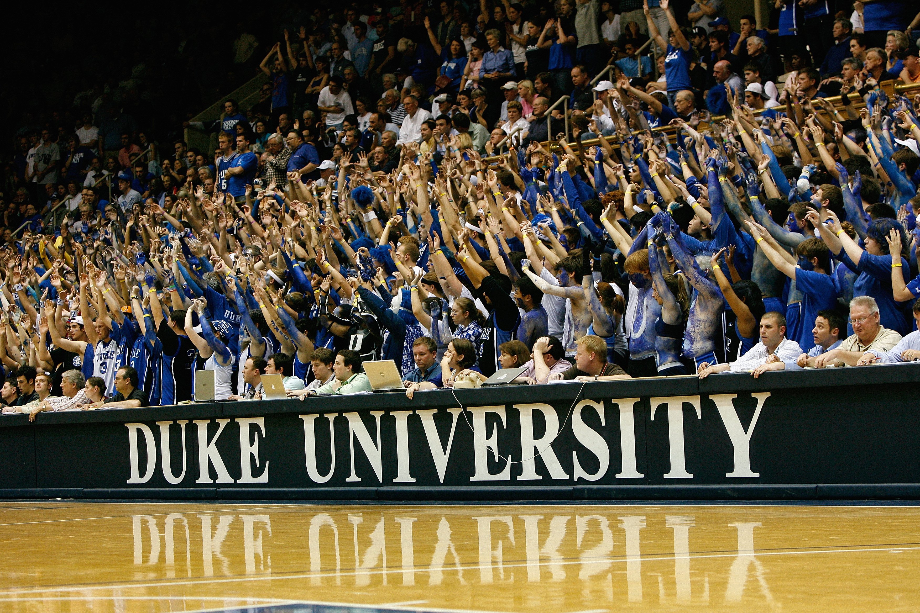 DURHAM, NC - FEBRUARY 11:  Duke Blue Devils fans hold up their hands during the game against the North Carolina Tar Heels on February 11, 2009 at Cameron Indoor Stadium in Durham, North Carolina.  (Photo by Kevin C. Cox/Getty Images)