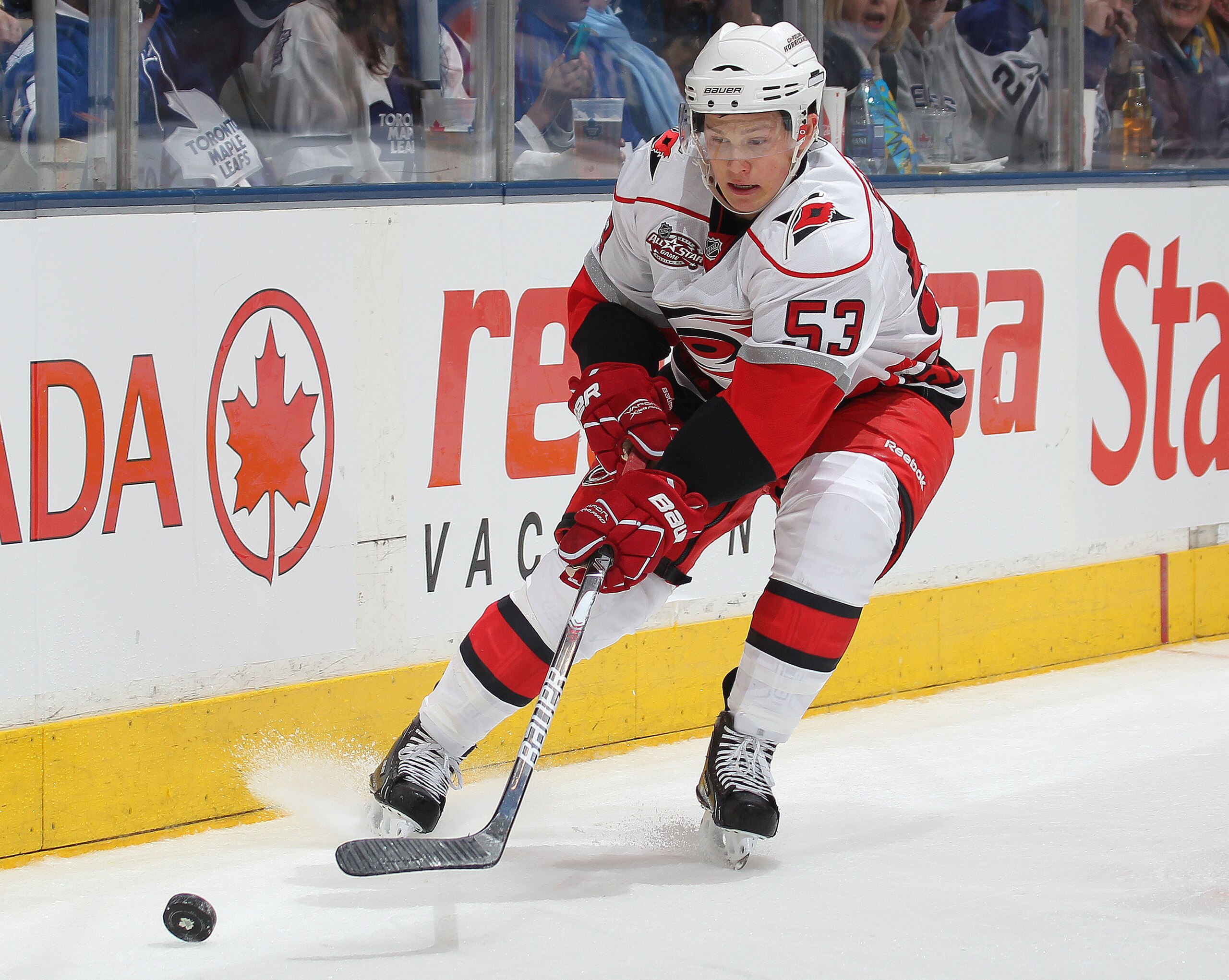 TORONTO, ON - DECEMBER 28:  Jeff Skinner #53 of the Carolina Hurricanes tries to handle the puck in a game against the Toronto Maple Leafs on December 28, 2010 at the Air Canada Centre in Toronto,Ontario. The Hurricanes defeated the Leafs 4-3. (Photo by C