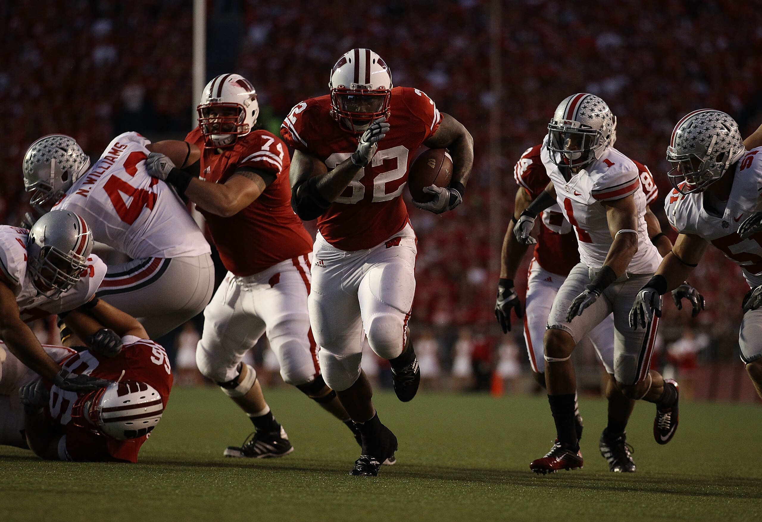 MADISON, WI - OCTOBER 16: John Clay #32 of the Wisconsin Badgers runs for a touchdown against the Ohio State Buckeyes at Camp Randall Stadium on October 16, 2010 in Madison, Wisconsin. Wisconsin defeated Ohio State 31-18. (Photo by Jonathan Daniel/Getty I