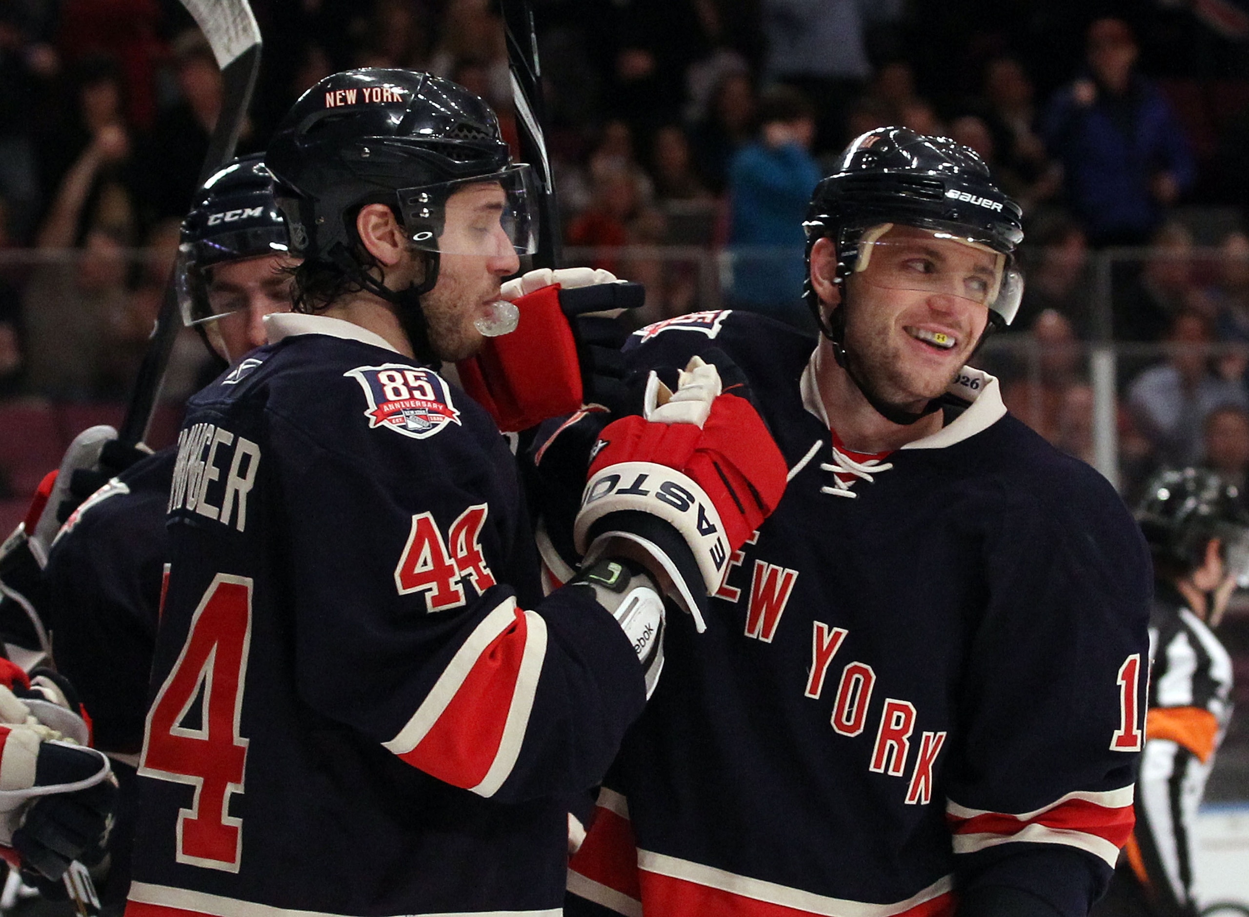 NEW YORK, NY - JANUARY 19: Steve Eminger #44 of the New York Rangers and Marian Gaborik #10 celebrate Gaborik's hat trick goal against the Toronto Maple Leafs at Madison Square Garden on January 19, 2011 in New York City.  (Photo by Bruce Bennett/Getty Im
