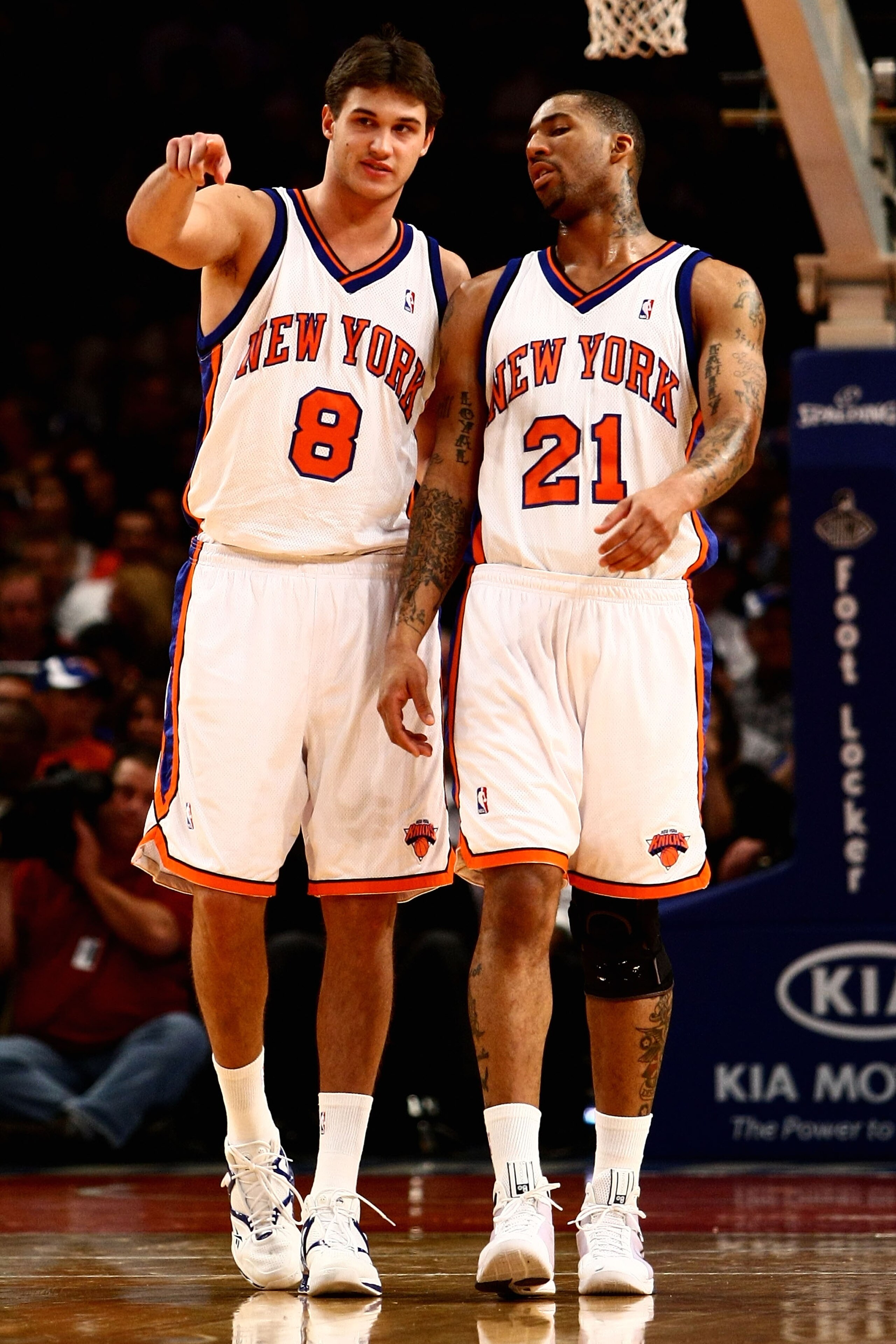 NEW YORK - OCTOBER 29:  Danilo Gallinari #8 of the New York Knicks and teammate Wilson Chandler #21 talk during a break in the action against the Miami Heat at Madison Square Garden October 29, 2008 in New York City. NOTE TO USER: User expressly acknowled