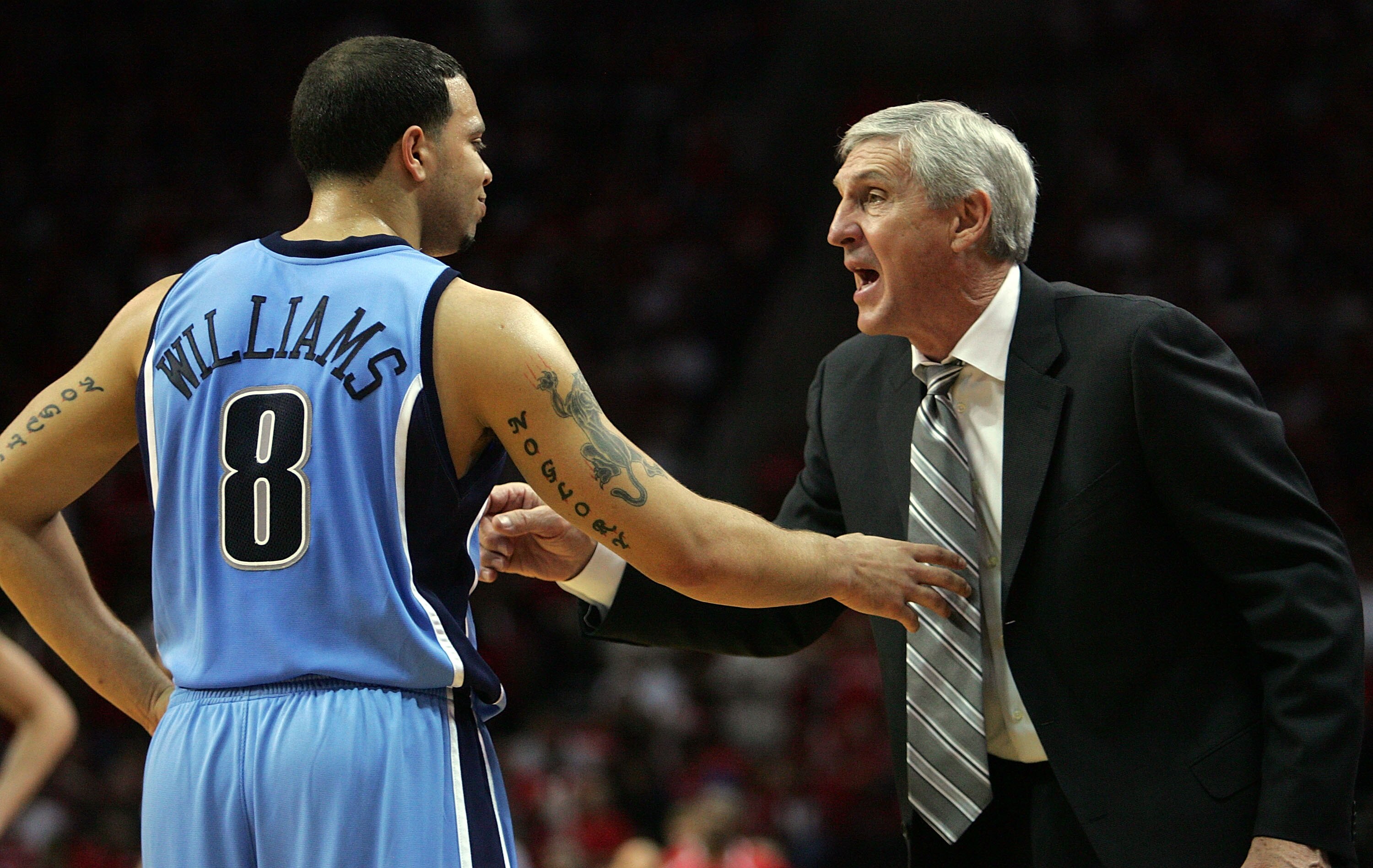 HOUSTON - MAY 5:  Head coach Jerry Sloan talks with Deron Williams #8 of the Utah Jazz in Game Seven of the Western Conference Quarterfinals during the 2007 NBA Playoffs at Toyota Center May 5, 2007 in Houston, Texas. NOTE TO USER: User expressly acknowle