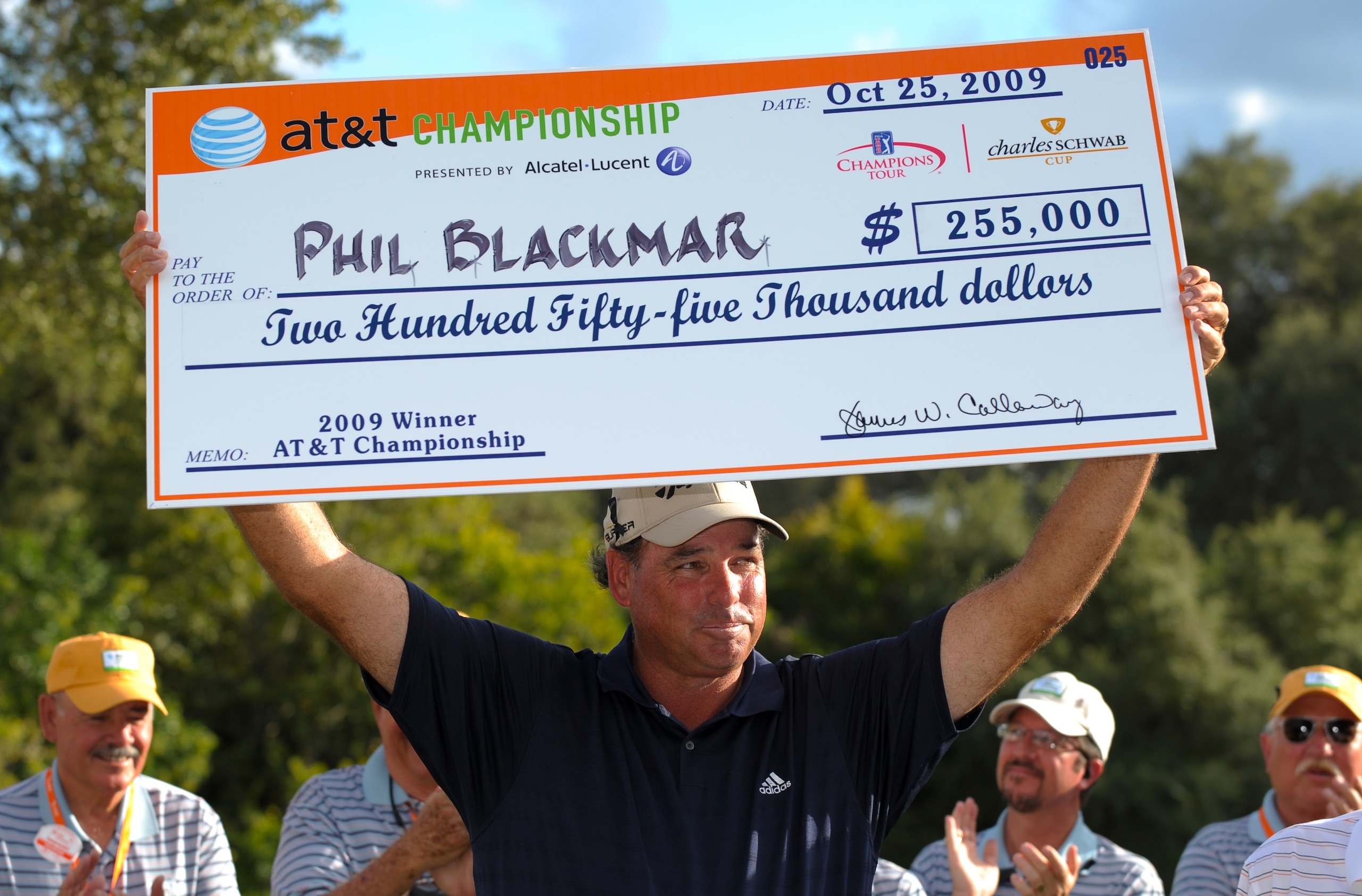 SAN ANTONIO - OCTOBER 25: Phil Blackmar lifts the winner's check after winning the PGA Champions Tour AT&T Championship at the Oak Hills Country Club on October 25, 2009 in San Antonio, Texas. (Photo by Robert Laberge/Getty Images) SAN ANTONIO - OCTOBER 25: Phil Blackmar lifts the winner's check after winning the PGA Champions Tour AT&T Championship at the Oak Hills Country Club on October 25, 2009 in San Antonio, Texas. (Photo by Robert Laberge/Getty Images)