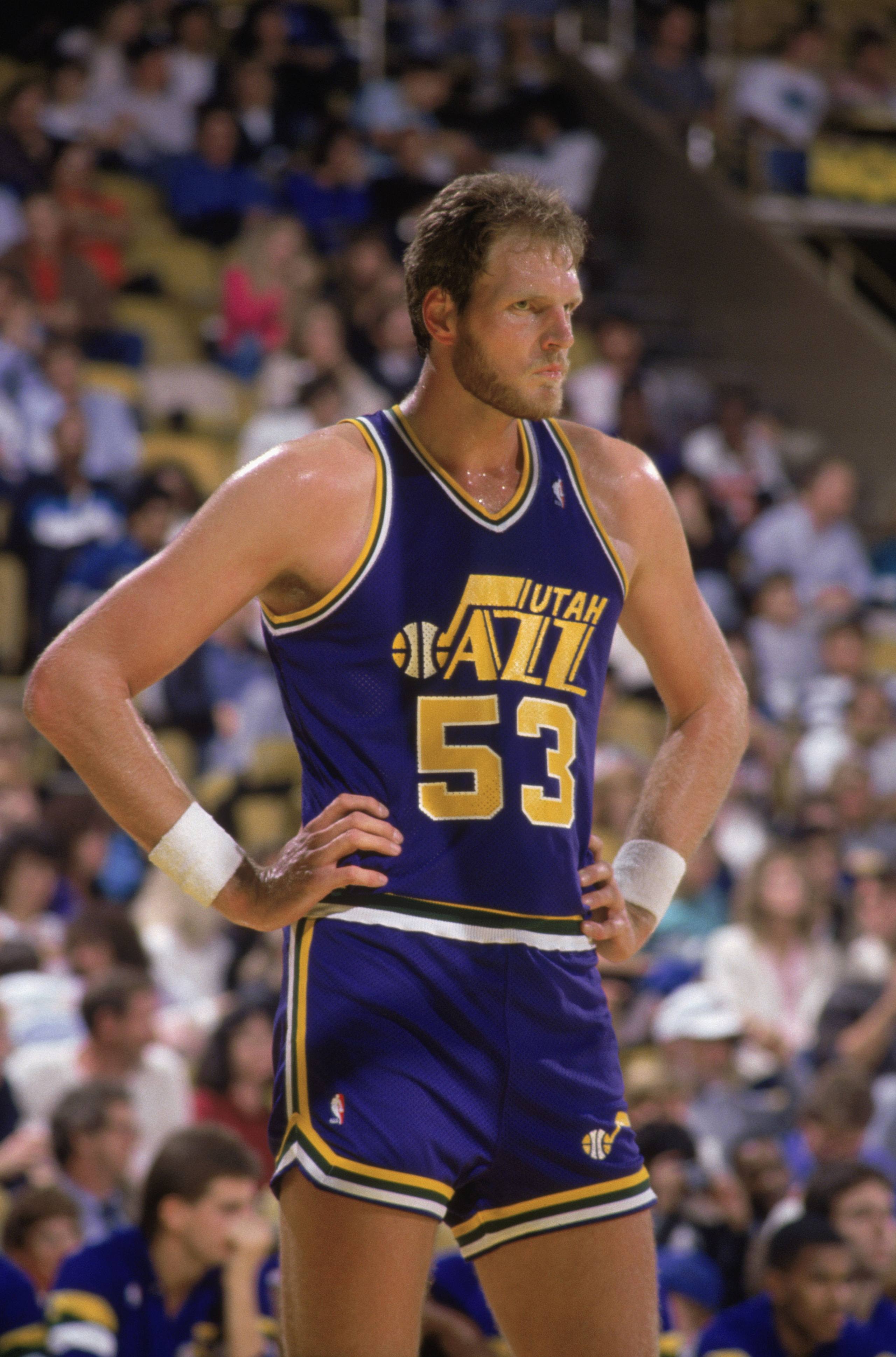 LOS ANGELES - 1989:  Mark Eaton #53 of the Utah Jazz stands on the court during an NBA game against the Los Angeles Lakers at the Great Western Forum in Los Angeles, California in 1989. (Photo by Tim DeFrisco/Getty Images)