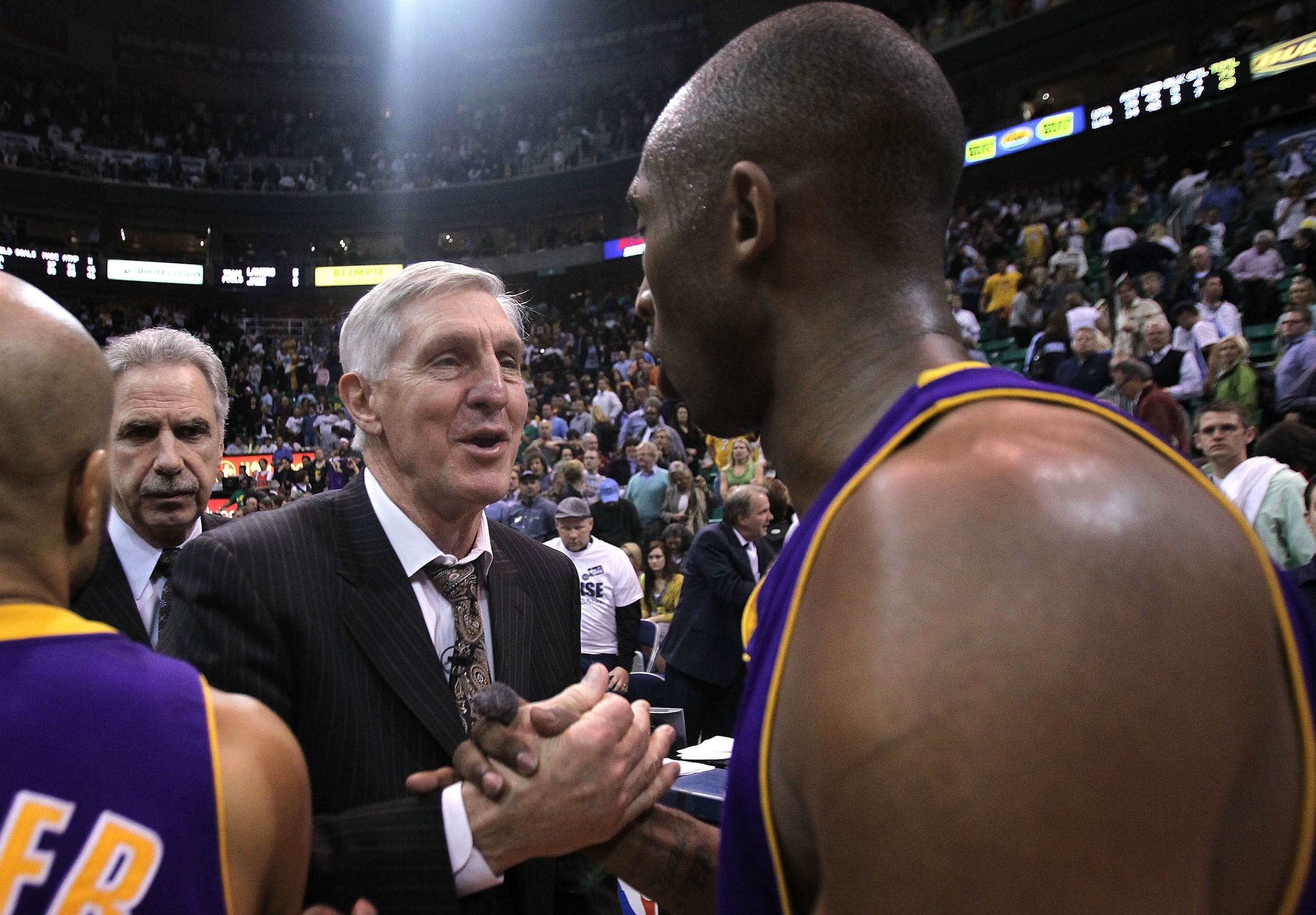 SALT LAKE CITY - MAY 10: Kobe Bryant #24 of the Los Angeles Lakers talks with head coach Jerry Sloan of the Utah Jazz after Game Four of the Western Conference Semifinals of the 2010 NBA Playoffs on May 10, 2010 at Energy Solutions Arena in Salt Lake City