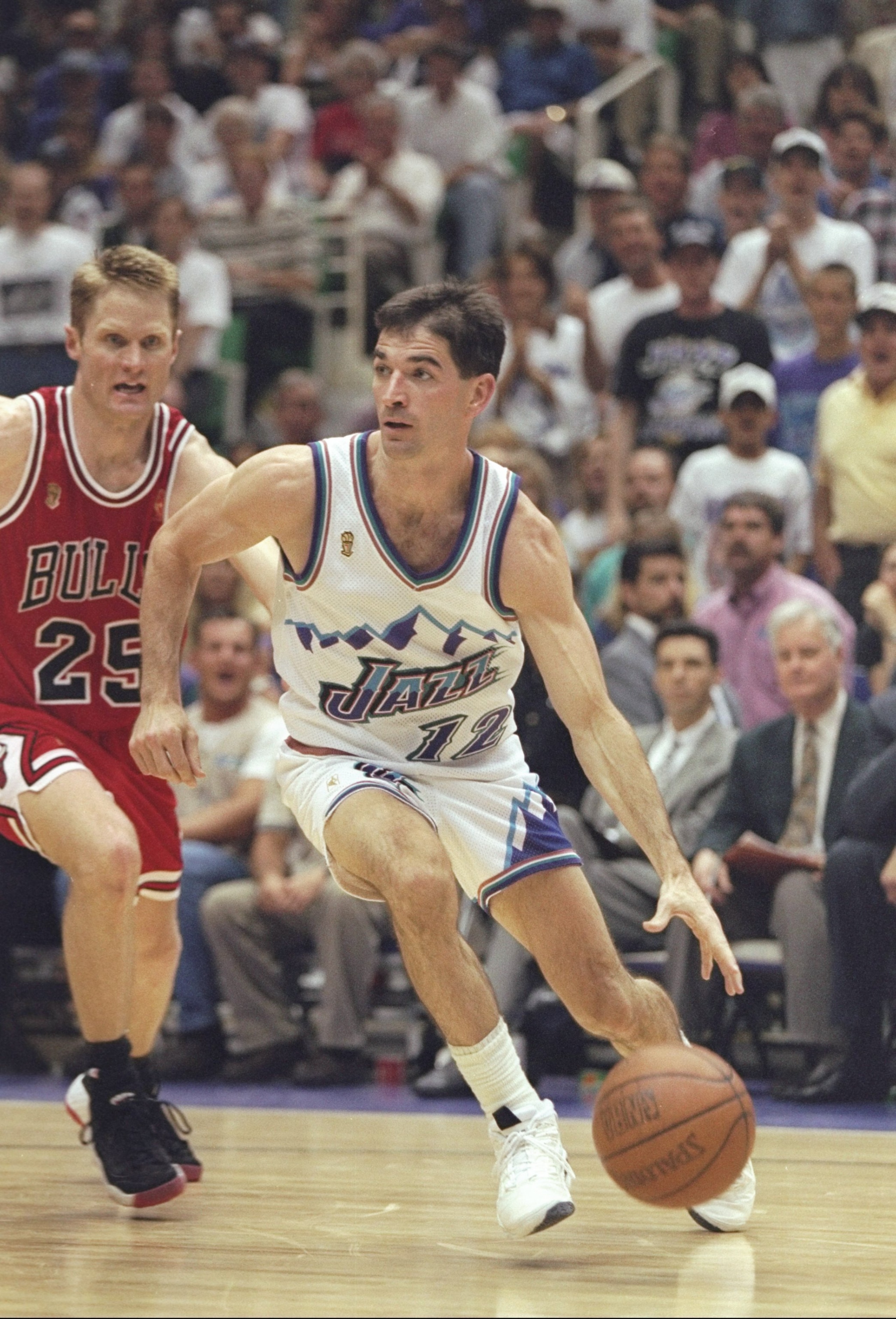 8 Jun 1997: John Stockton #12 of the Utah Jazz dribbles the ball during the Jazz 78-73 win over the Chicago Bulls in Game 4 of the NBA Finals at the Delta Center in Salt Lake City, Utah.