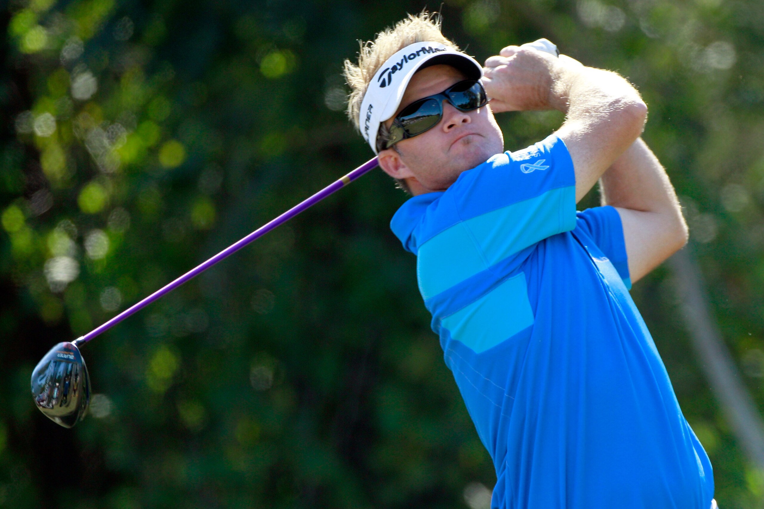 LAKE BUENA VISTA, FL - NOVEMBER 13:  Brian Gay hits a shot on the 4th hole during the third round of the Children's Miracle Network Classic at the Disney Palm and Magnolia course on November 13, 2010 in Lake Buena Vista, Florida.  (Photo by Sam Greenwood/