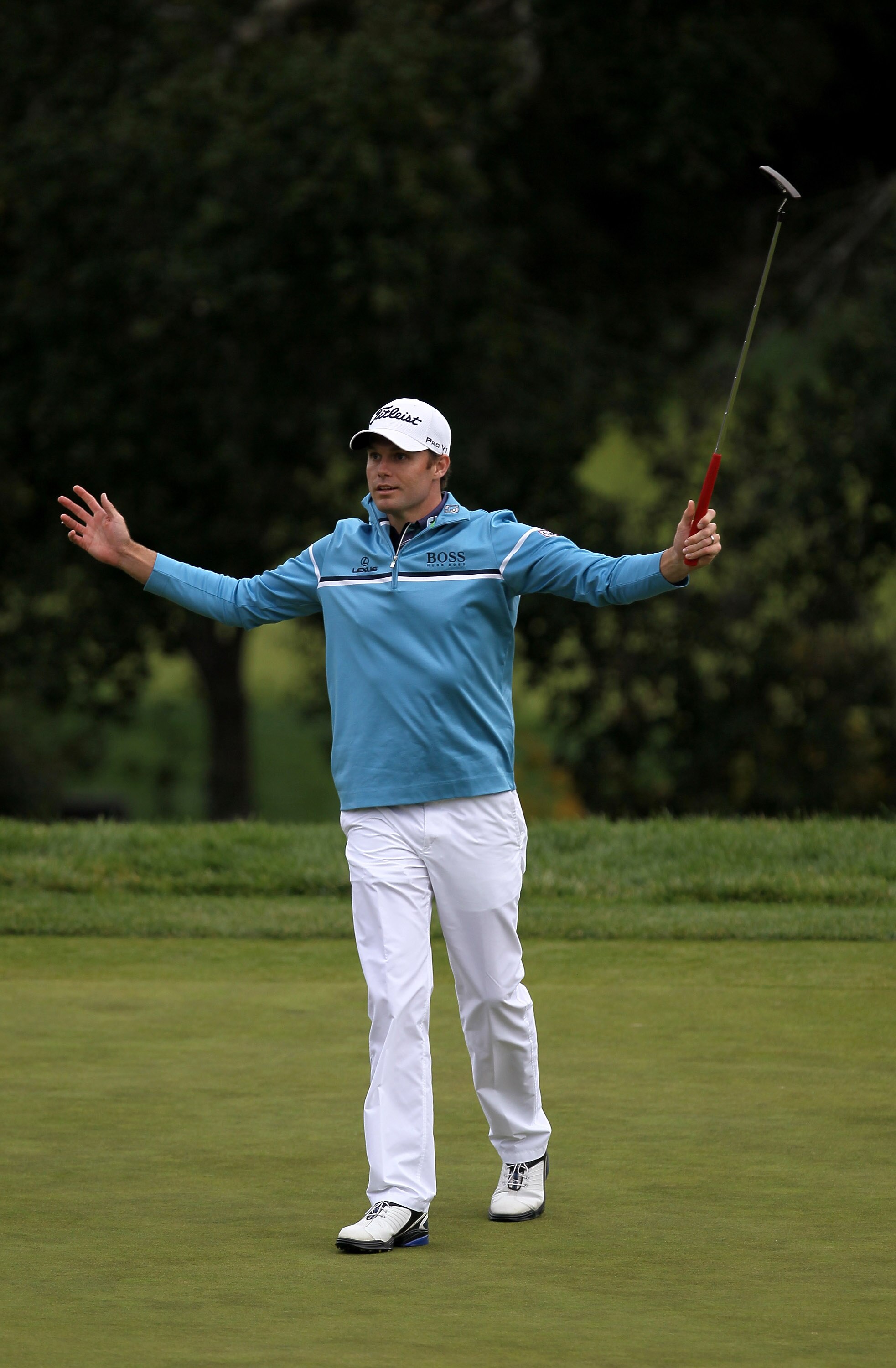 THOUSAND OAKS, CA - DECEMBER 4:  Nick Watney reacts after making a long birdie putt on the 18th hole during round three of the Chevron World Challenge at Sherwood Country Club on December 4, 2010 in Thousand Oaks, California.  (Stephen Dunn/Getty Images)